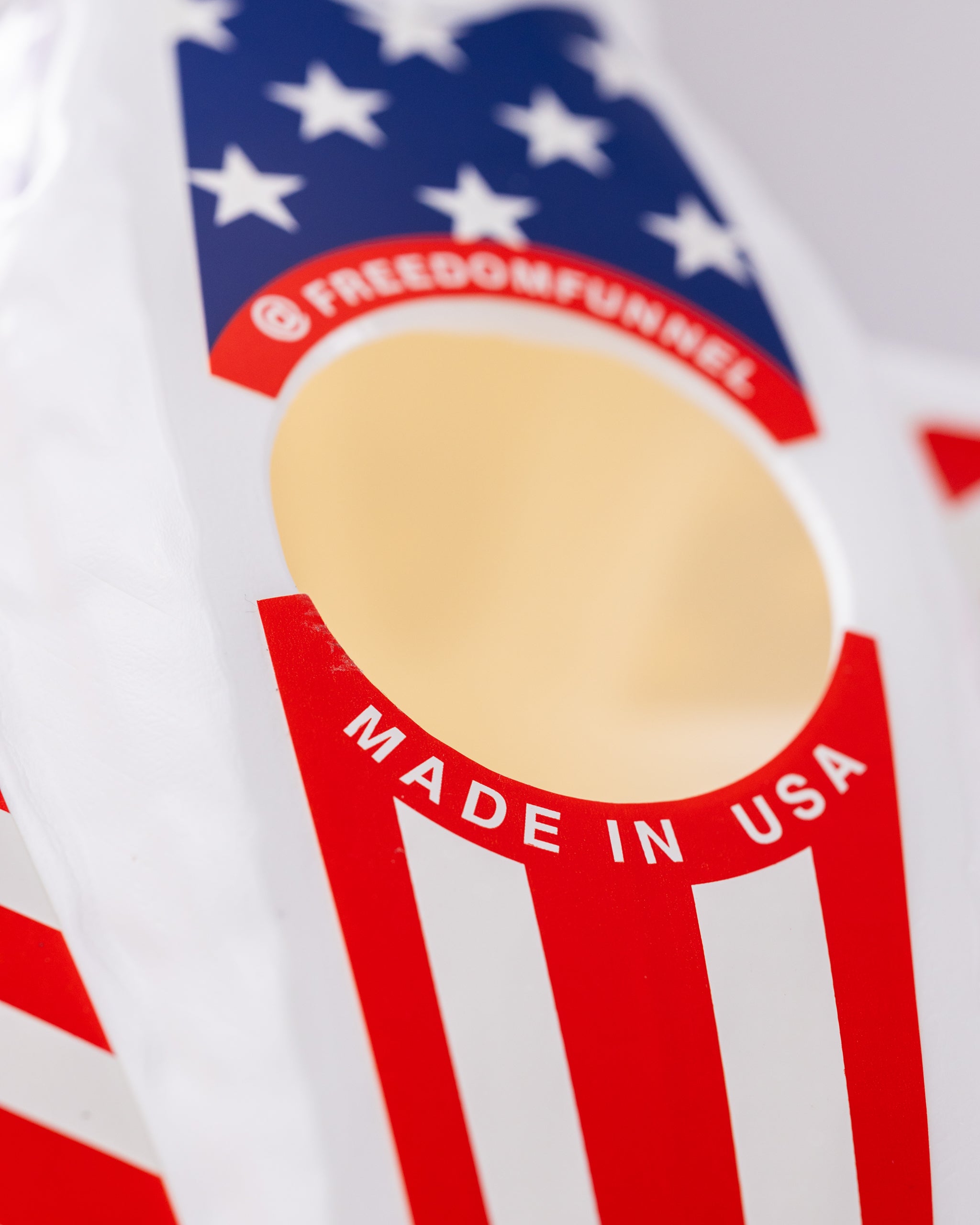 Alt text: "Pins and Aces Freedom Funnel for easy beer drinking, featuring a patriotic design and collapsible feature."