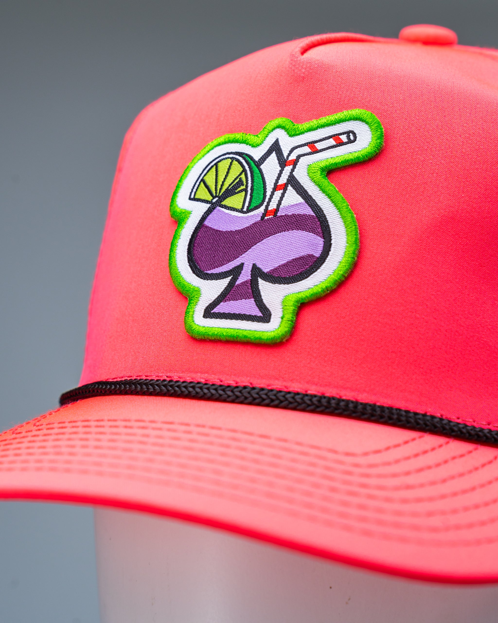 Perforated rope hat in Transfusion highlighter pink with a stylish design.