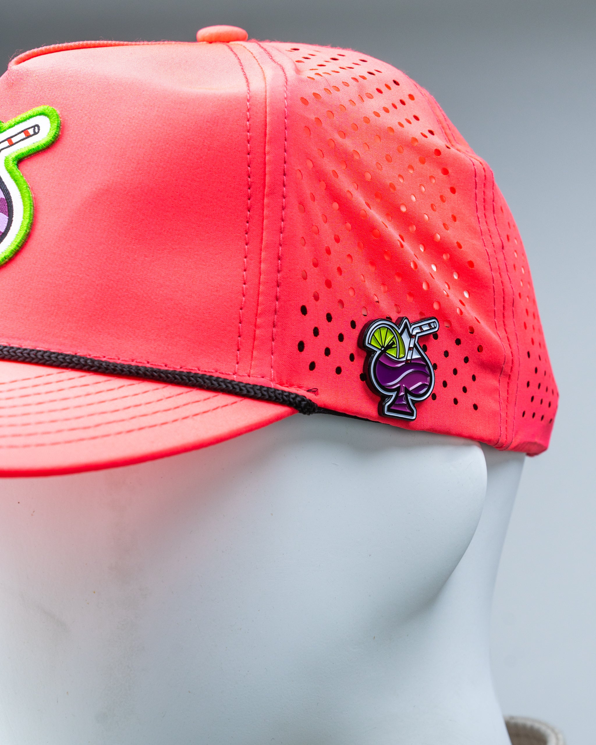 Perforated Rope Hat in Transfusion Highlighter Pink with a stylish design and adjustable strap.