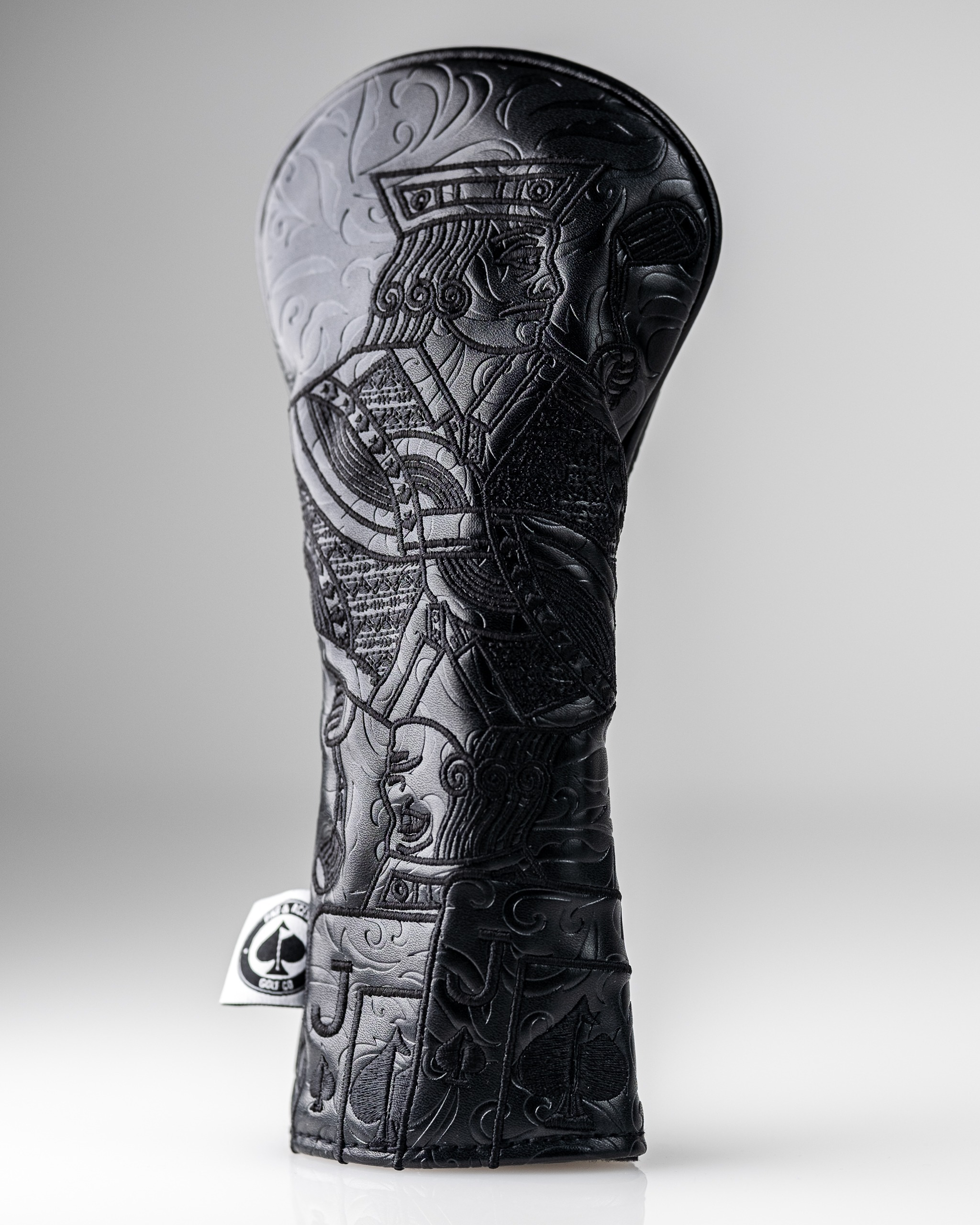 Blackout Jack of Spades hybrid cover featuring intricate embossed design, ideal for golf club protection.