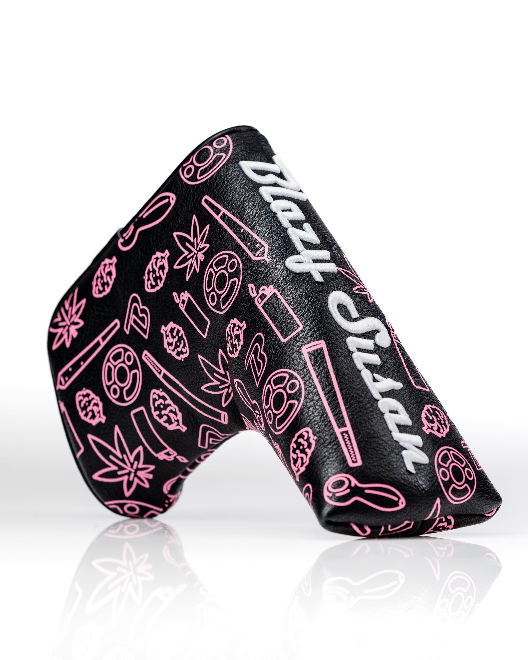 Bold black blade putter cover featuring vibrant pink designs and the "Blazy Susan" logo, perfect for stylish golfers.