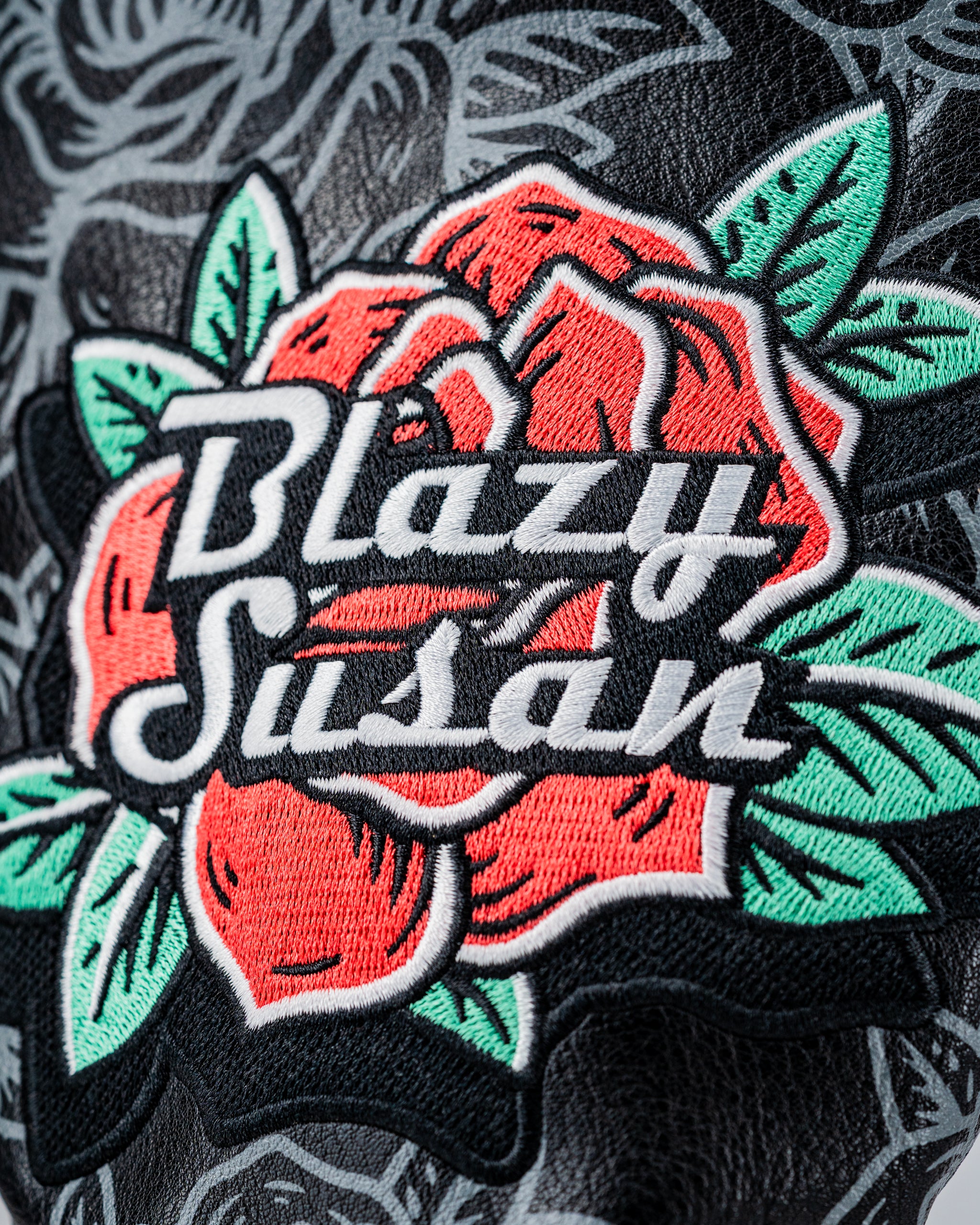 Bold driver cover featuring a vibrant rose design with "Blazy Susan" embroidered in stylish lettering. Perfect for standout golfers.
