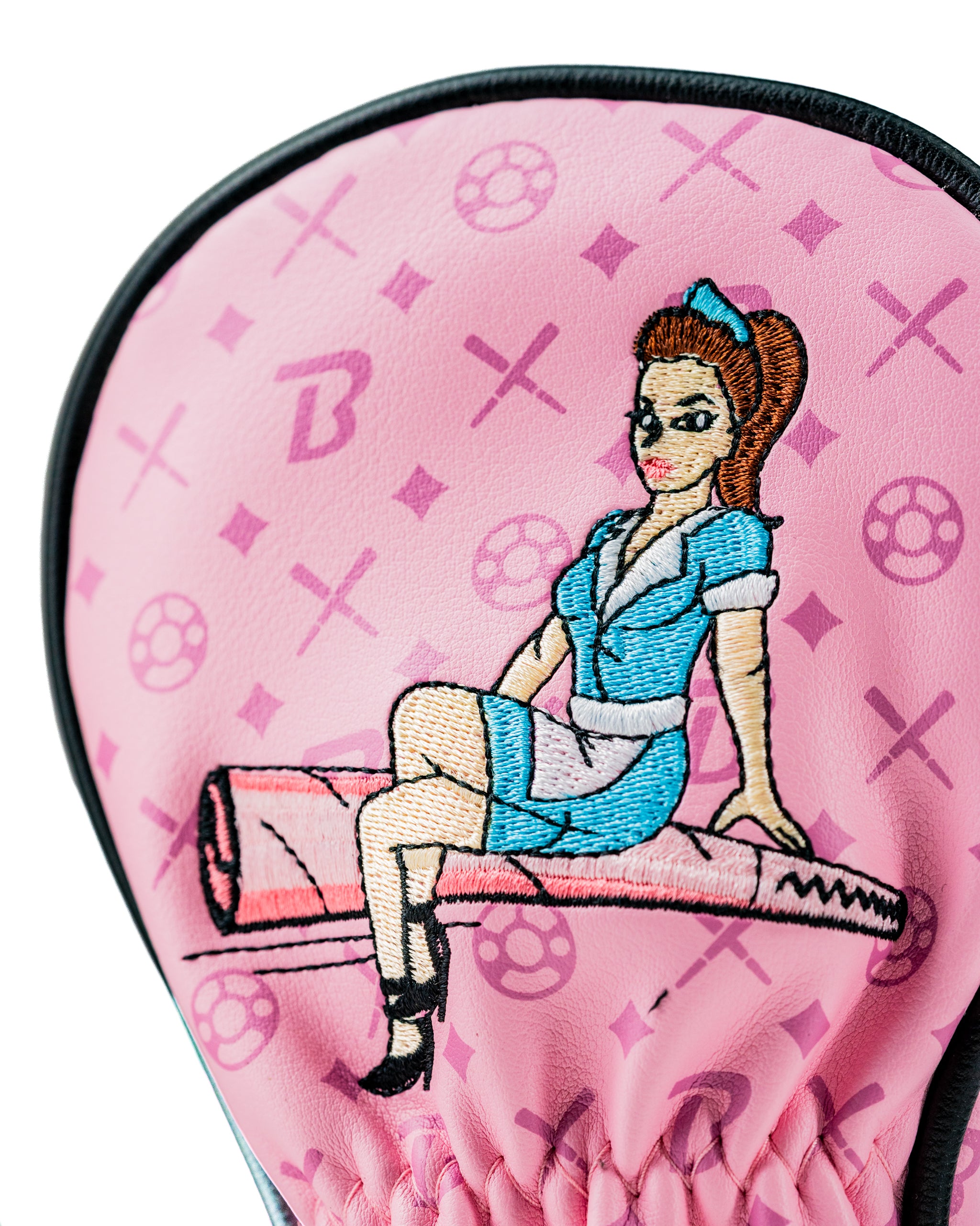 Bold pink hybrid golf cover featuring a vintage-inspired pin-up girl design, perfect for stylish golfers.