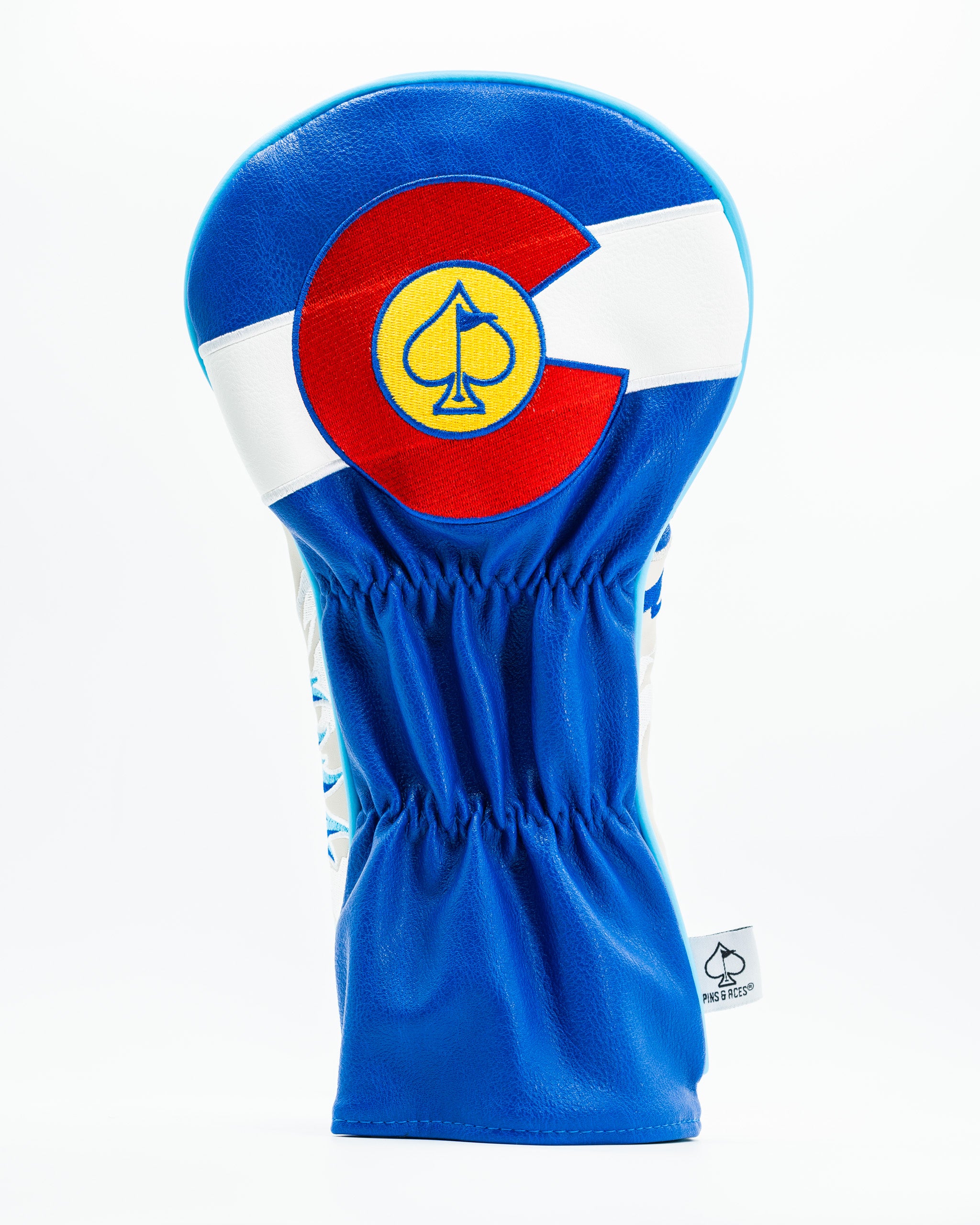 Blue and white golf driver cover featuring the Colorado state flag design with a spade symbol.