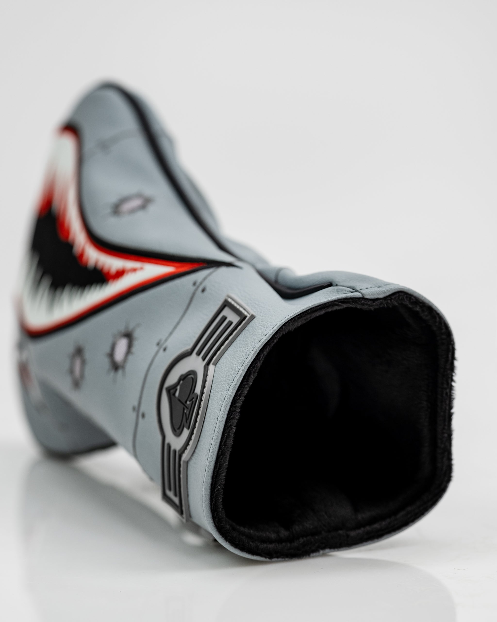 Bomber driver head cover with a sleek design and bold colors, featuring the word "Bomber" prominently displayed.