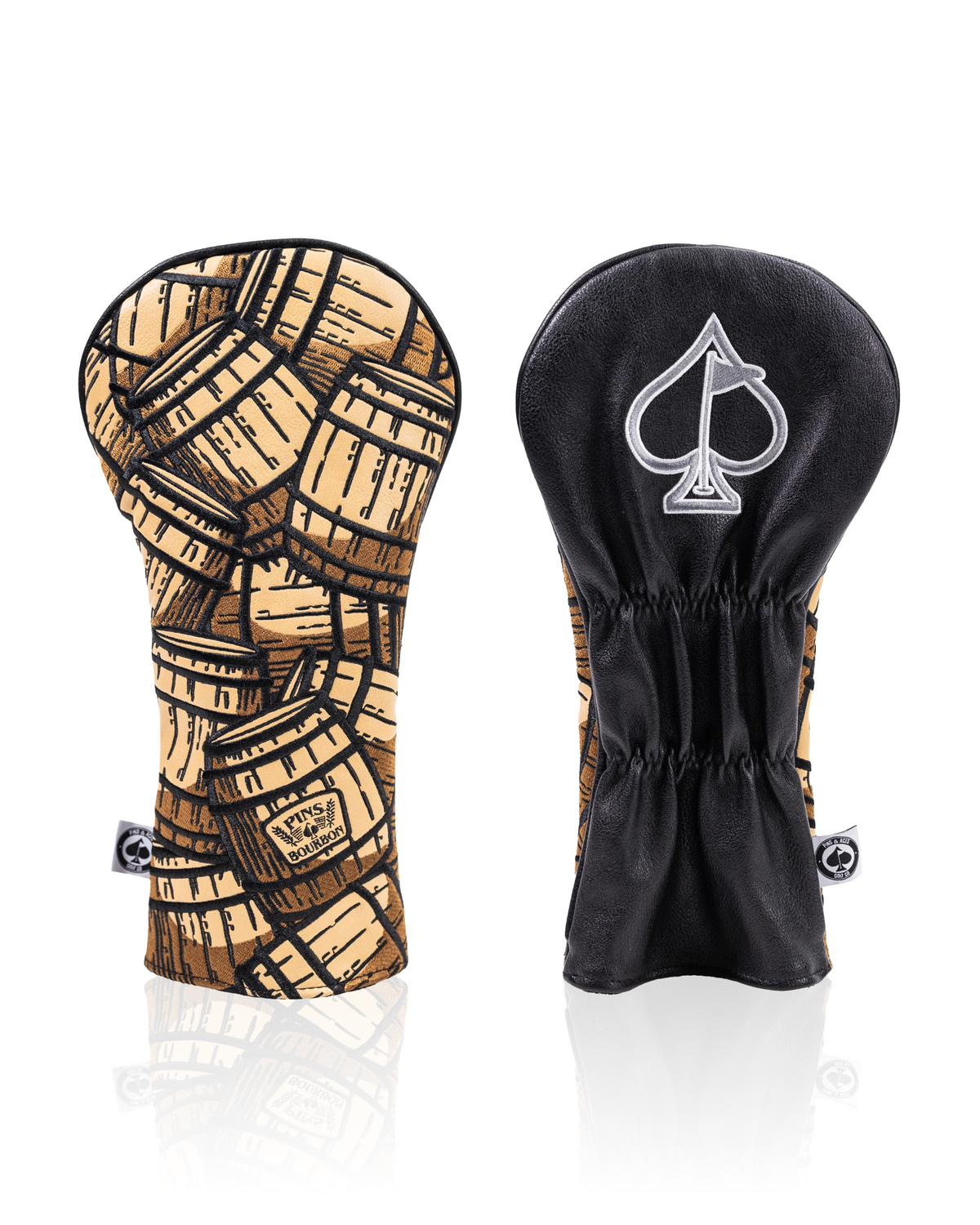 Bourbon barrel driver cover featuring a unique barrel print and a sleek black back with a logo, perfect for stylish golfers.