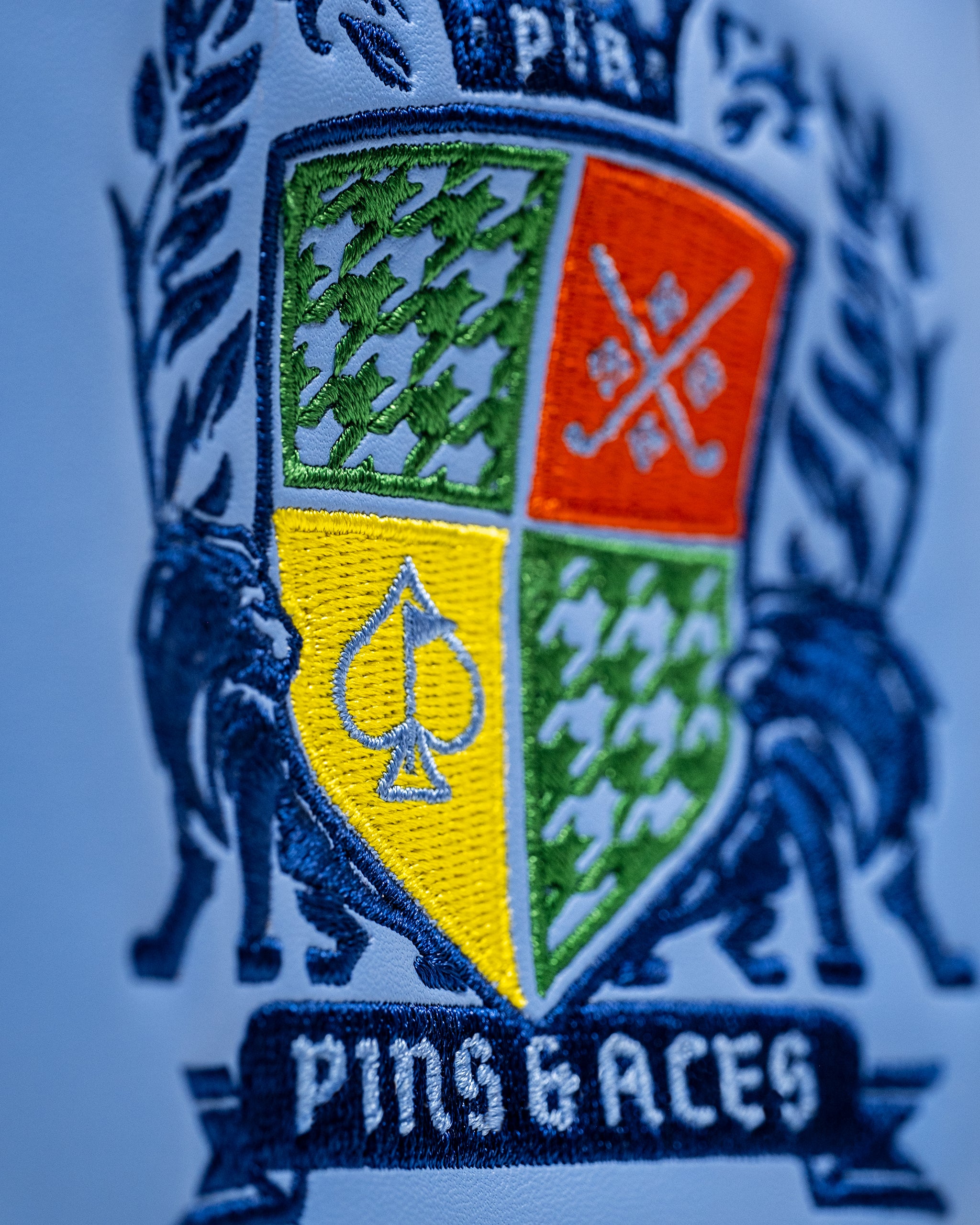 Alt text: "Coat of Arms mallet cover featuring a stylish design, perfect for golf club protection."