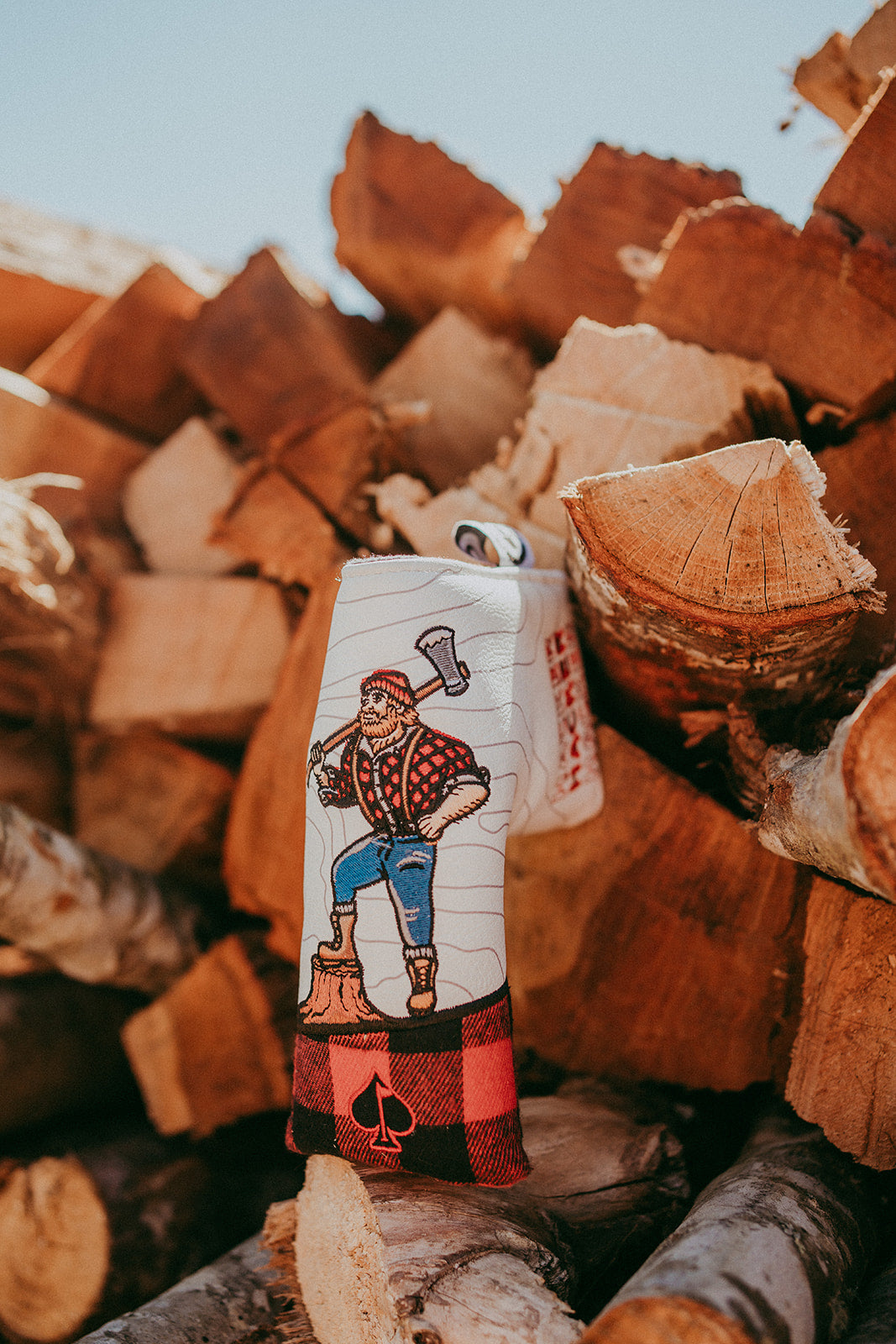 Hacker Blade Putter Cover featuring a sleek black design with stylish graphics, ideal for protecting golf putters.