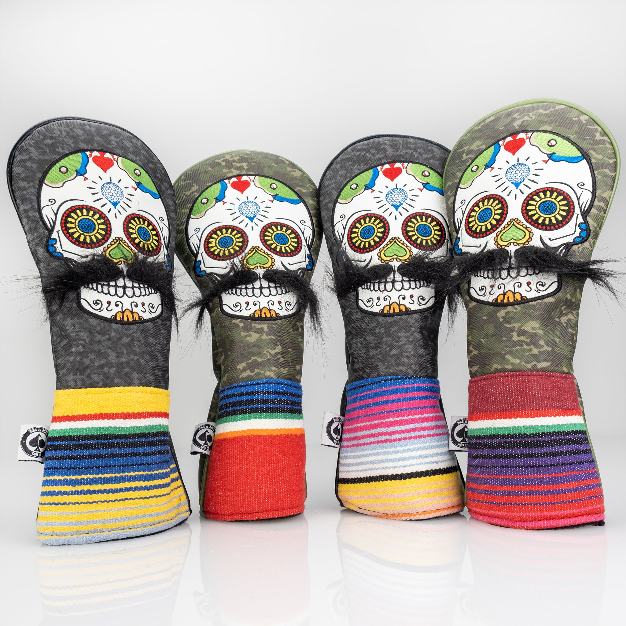 Colorful golf club headcovers with skull and floral designs, camo and striped patterns, for bold, standout style on the co...