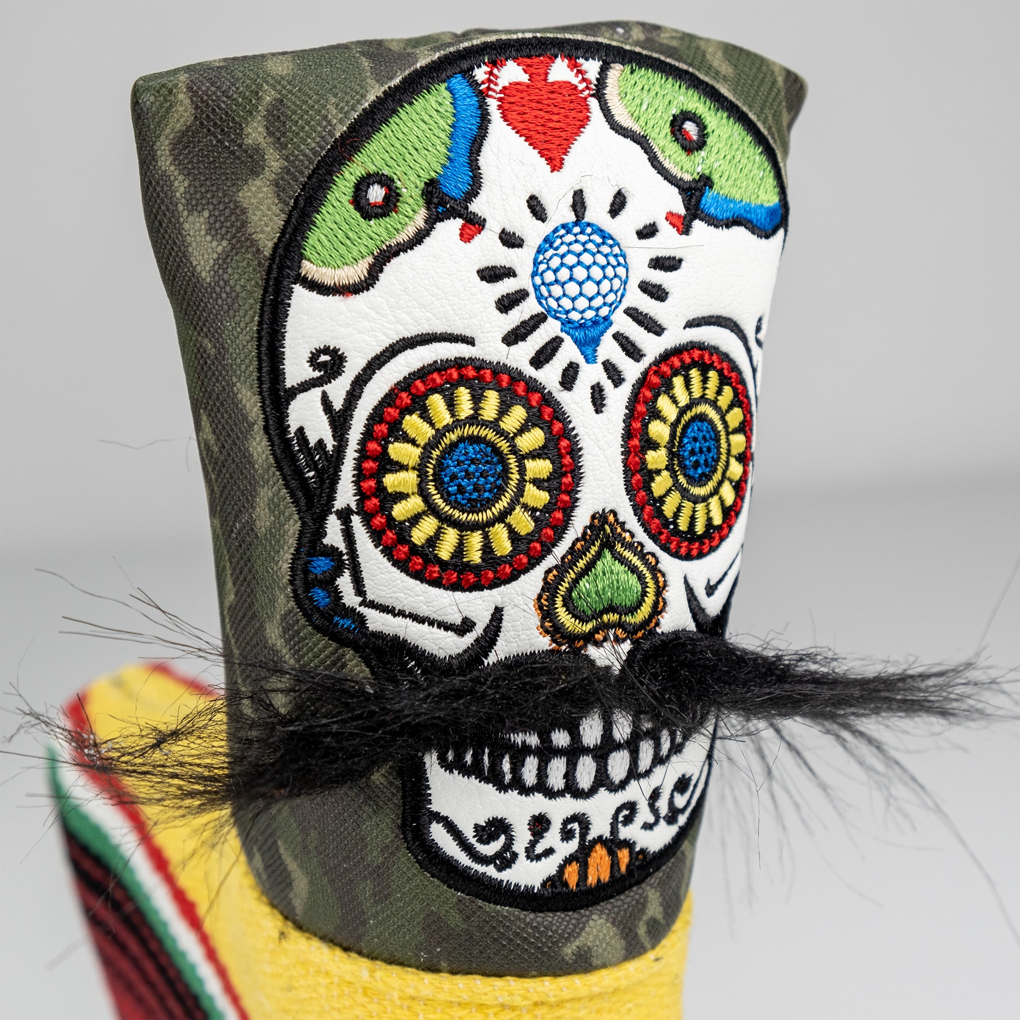 Colorful embroidered skull golf headcover with mustache, vibrant Day of the Dead design, perfect for bold golf style.