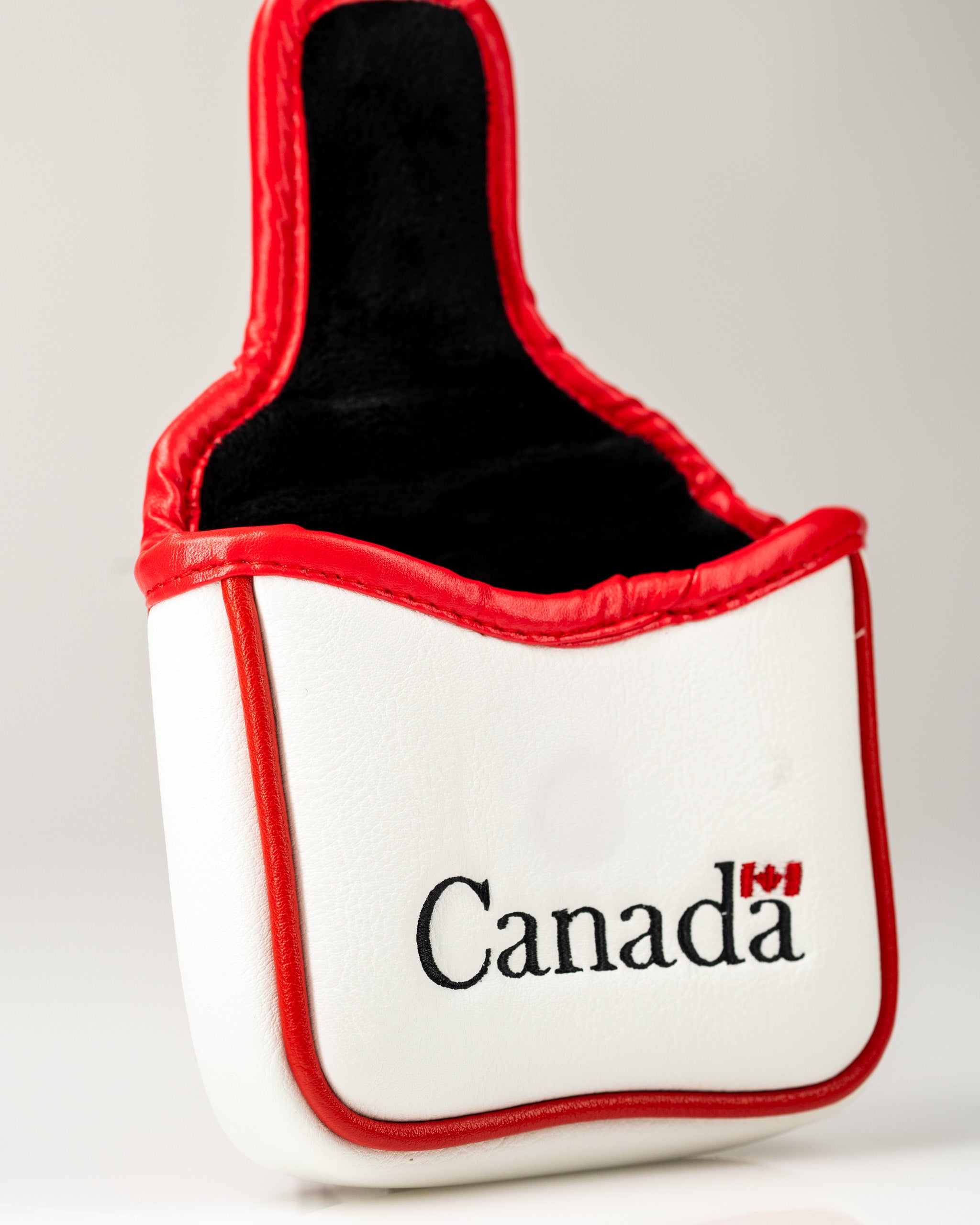 Canada mallet putter cover featuring a sleek white design with red accents and the word "Canada" prominently displayed.