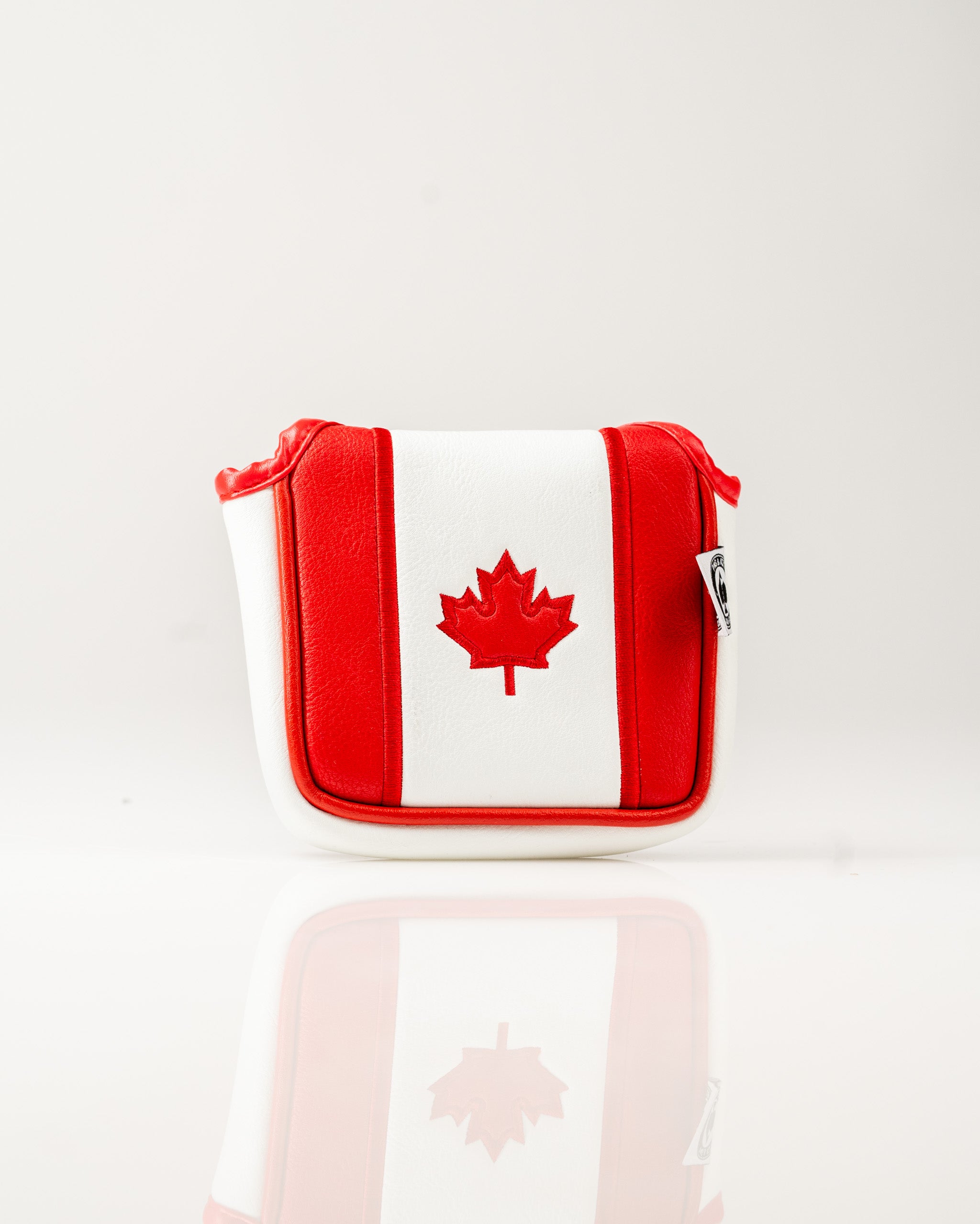 Bold mallet putter cover featuring the Canadian flag design in red and white with a prominent maple leaf.