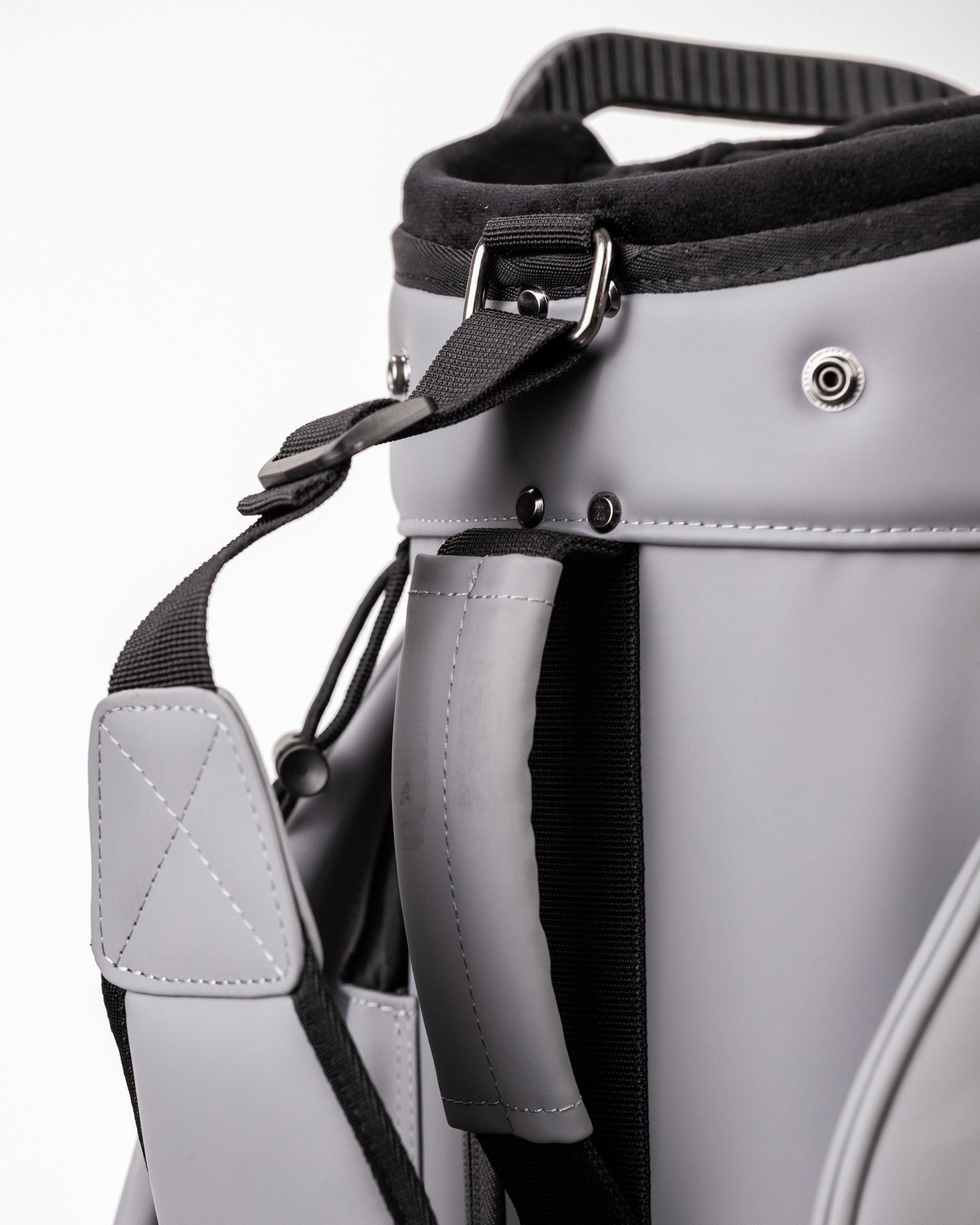 Player Preferred™ Cart Bag in Flat Ash color, showcasing a sleek design with multiple pockets and a comfortable strap for easy carrying.
