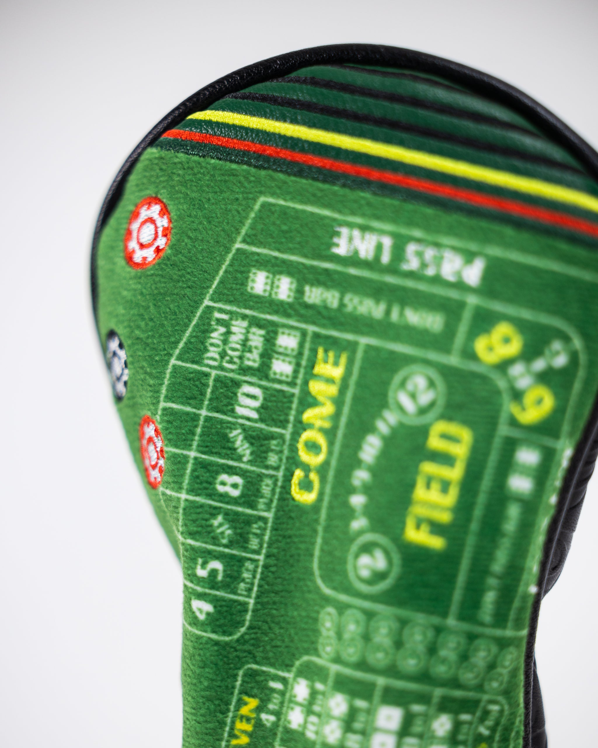 Craps hybrid golf club headcover featuring casino-themed design with vibrant colors and dice graphics.