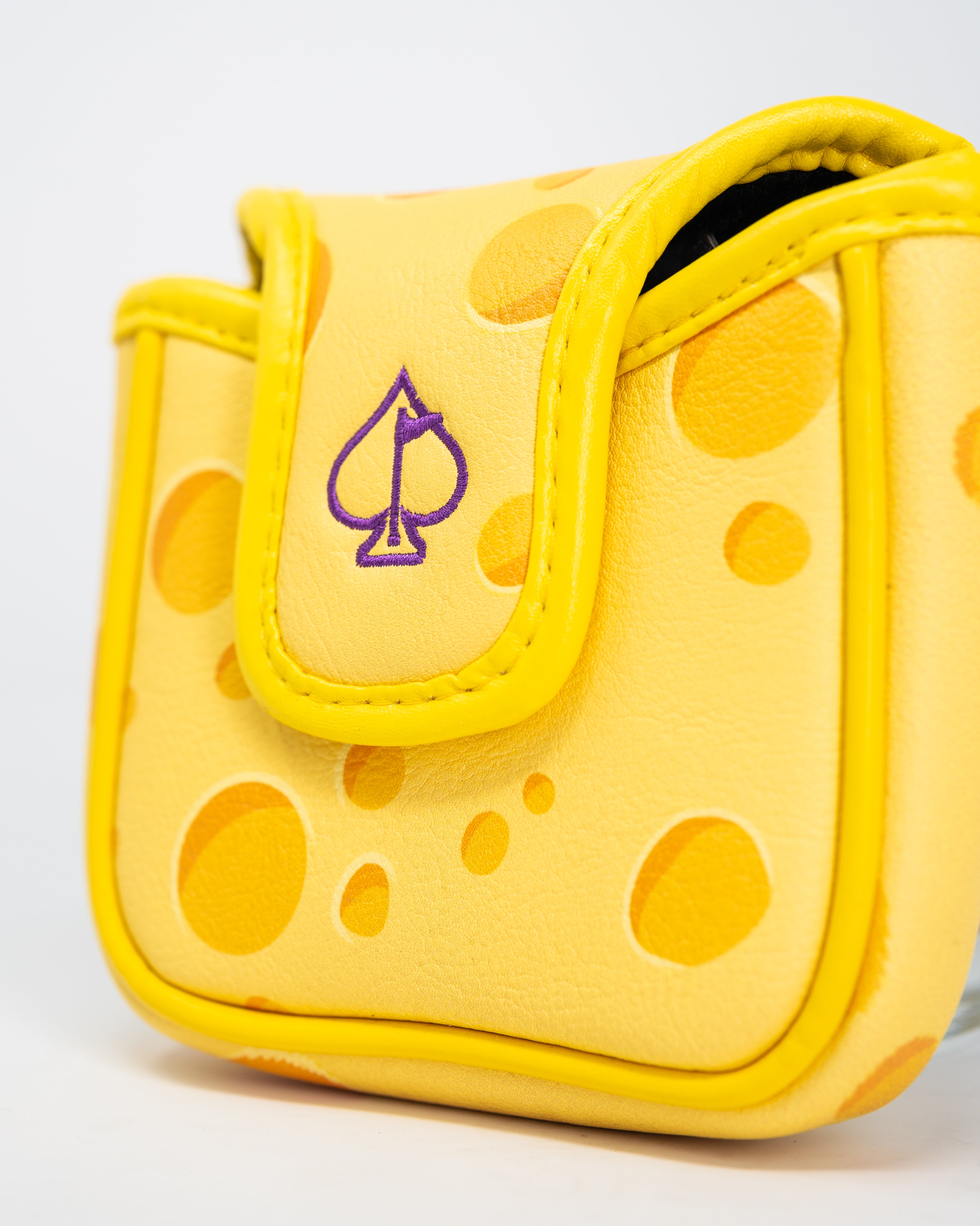 Alt text: Big Cheese Mallet Cover featuring a cheese-themed design, ideal for protecting mallets during storage or transport.