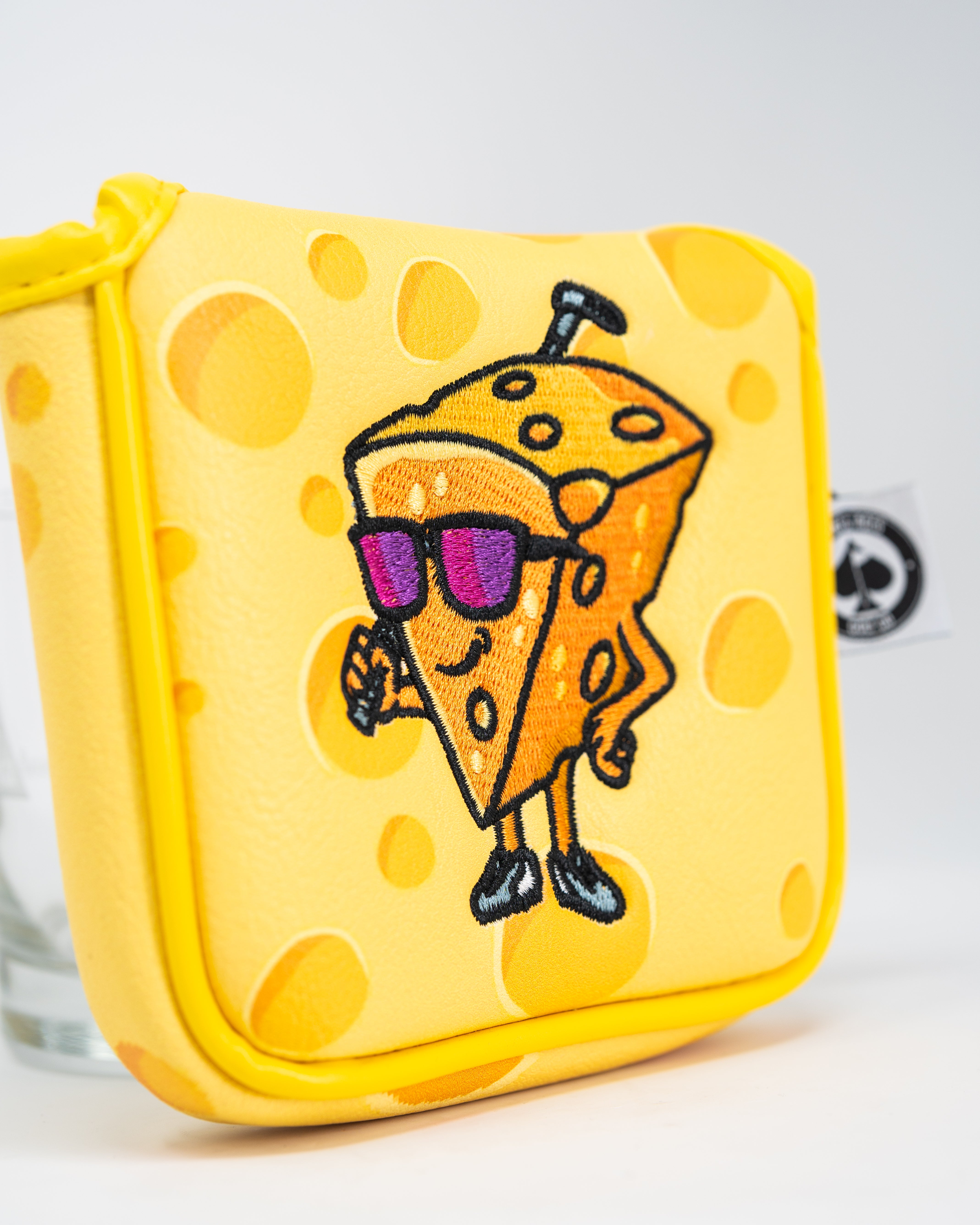 Big Cheese Mallet Cover designed to protect cheese while serving, featuring a stylish pattern and durable material.