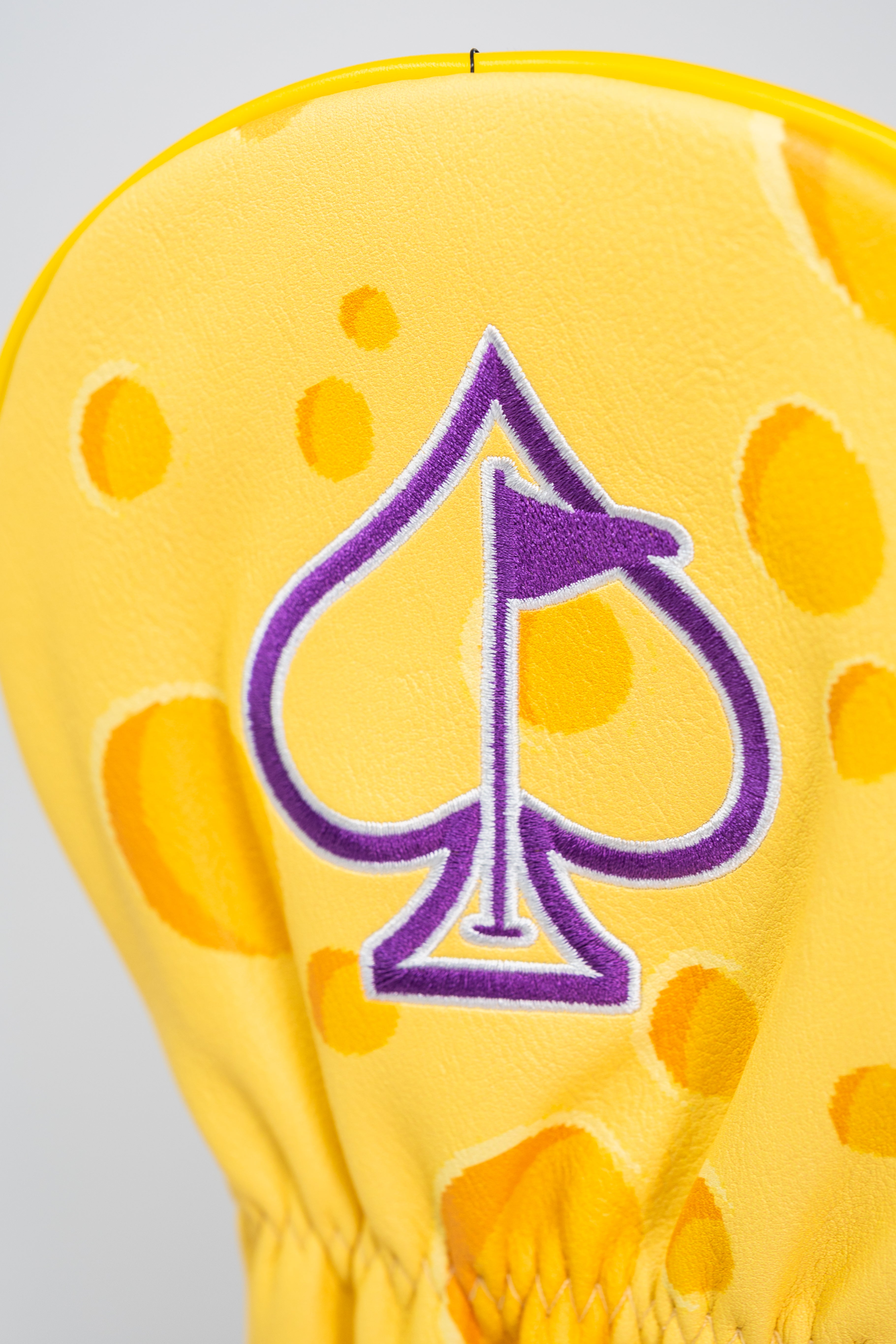 Big Cheese Driver Cover featuring a playful cheese wedge design, perfect for golf enthusiasts.