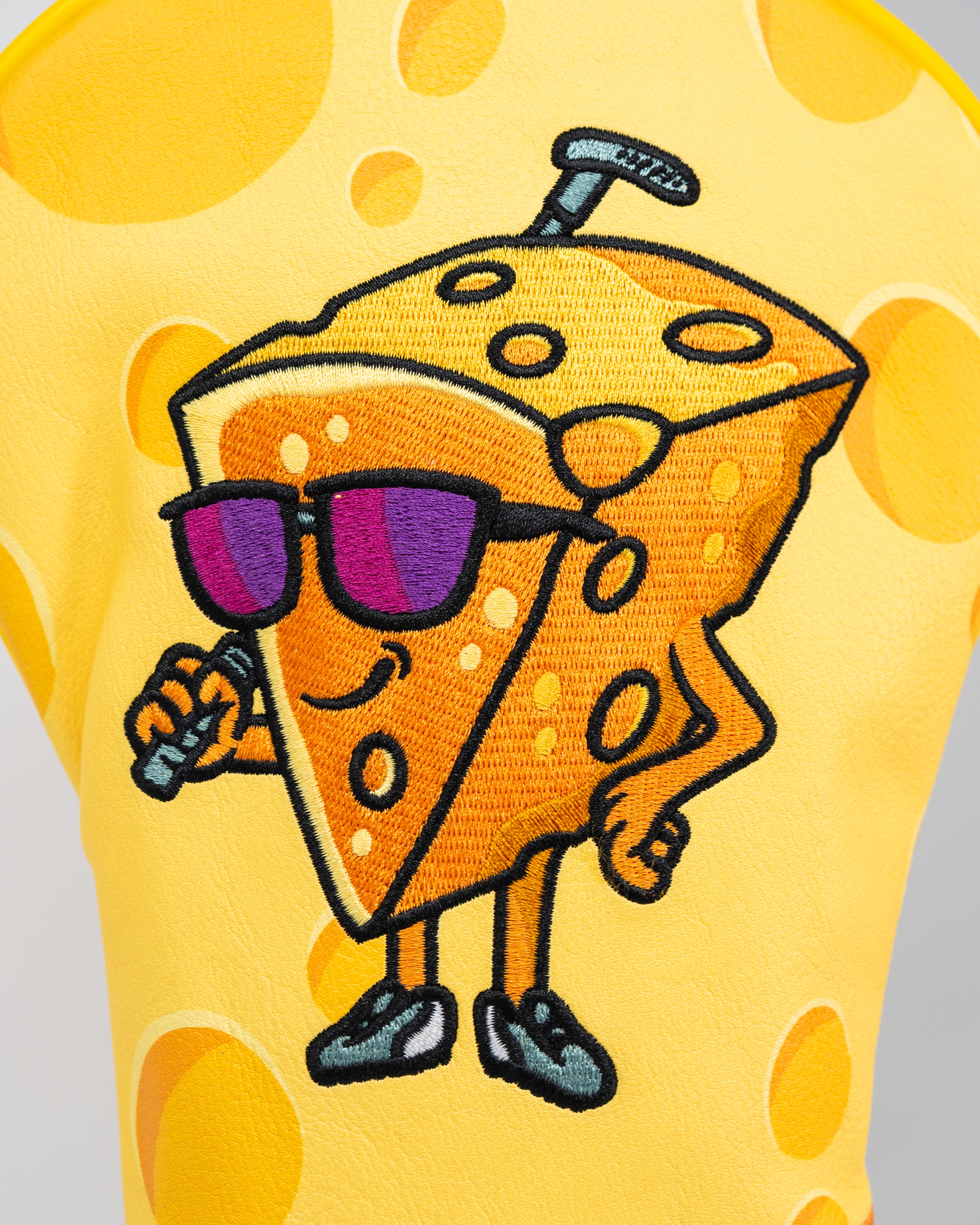 Big Cheese Driver Cover featuring a whimsical cheese design, ideal for protecting golf clubs.