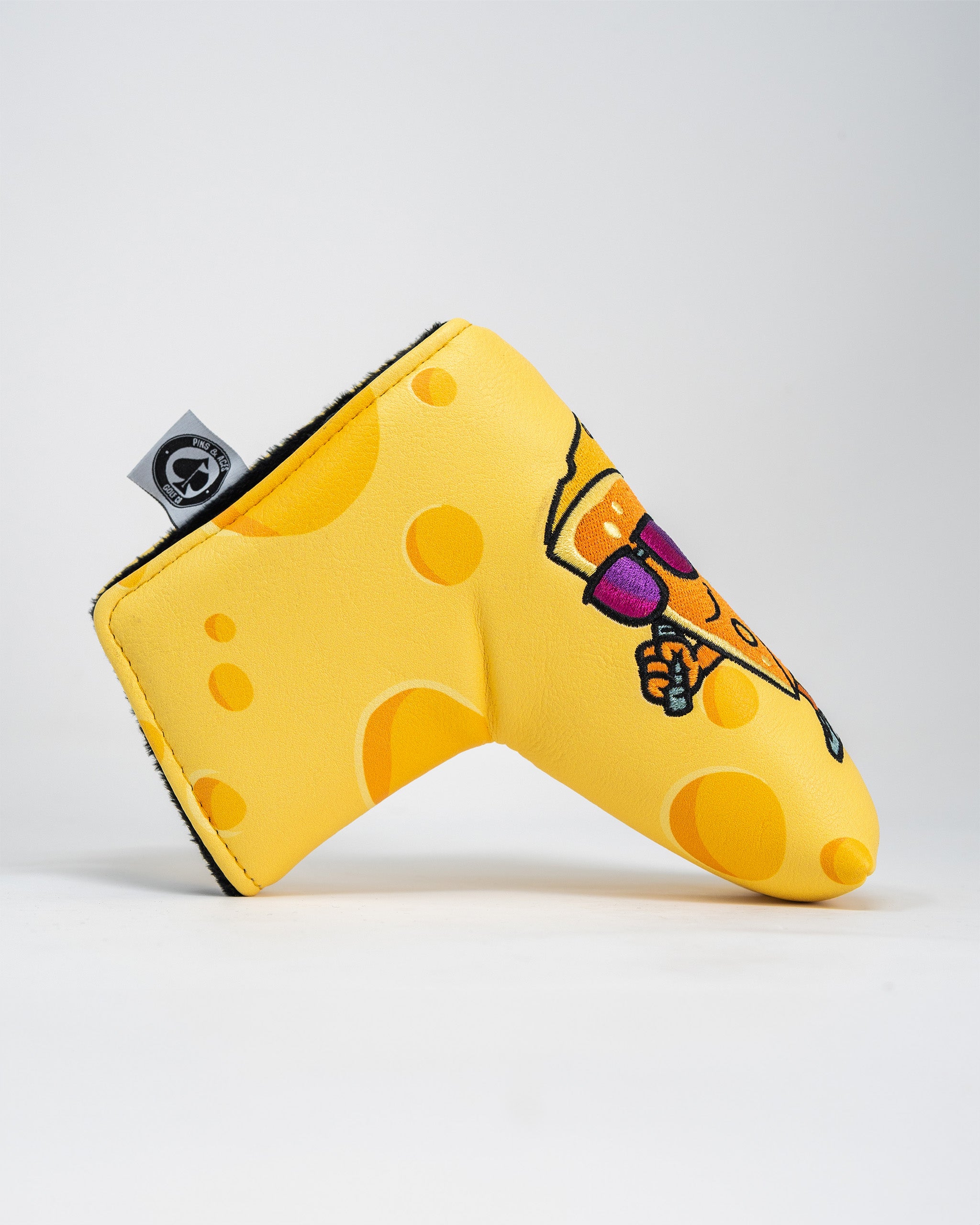 Big Cheese Blade Putter Cover in a whimsical cheese design, featuring a soft material and vibrant colors, perfect for protecting golf putters.