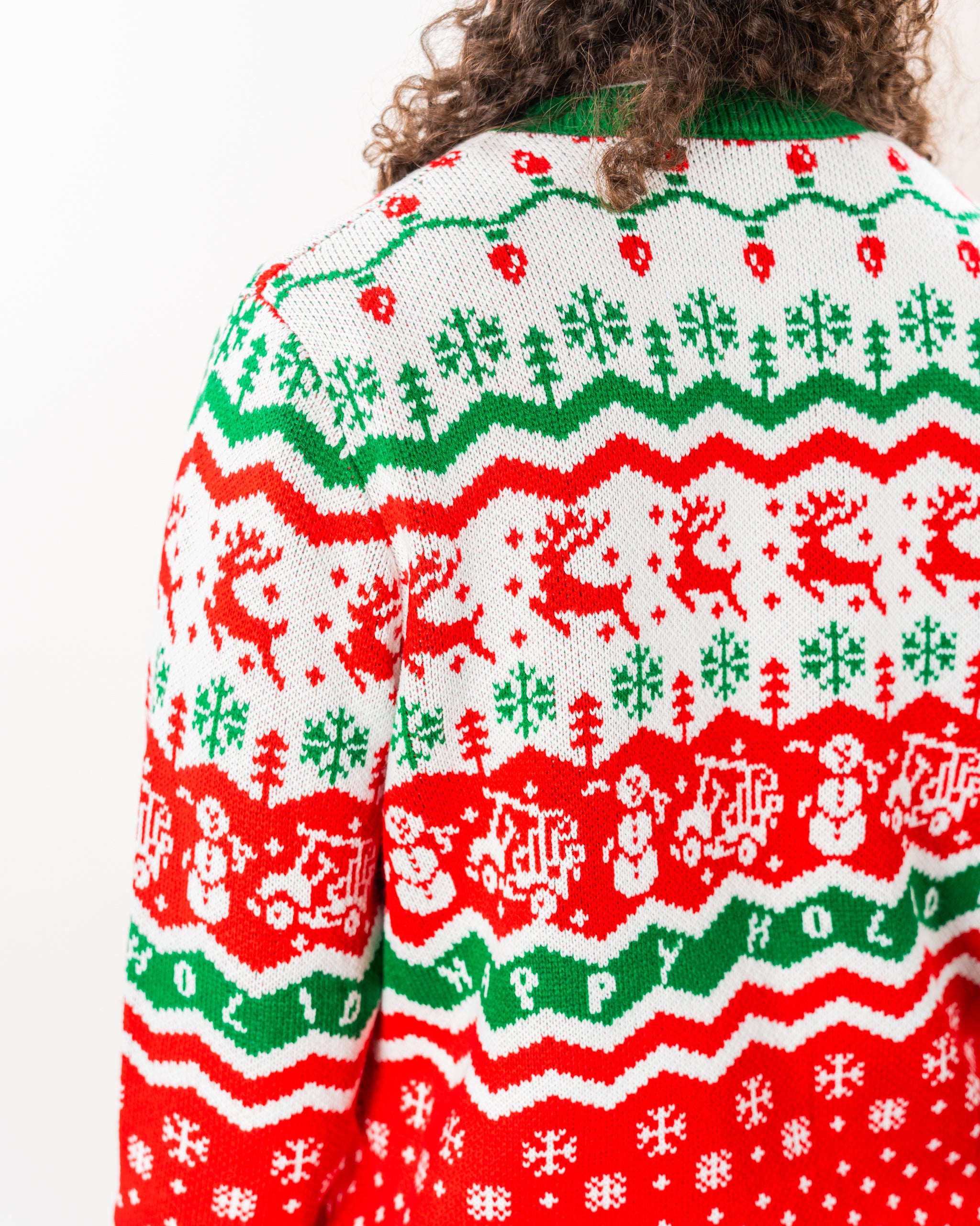 Pins & Aces Ugly Sweater 2024 featuring a festive design with vibrant colors, Christmas-themed patterns, and a humorous golf motif.