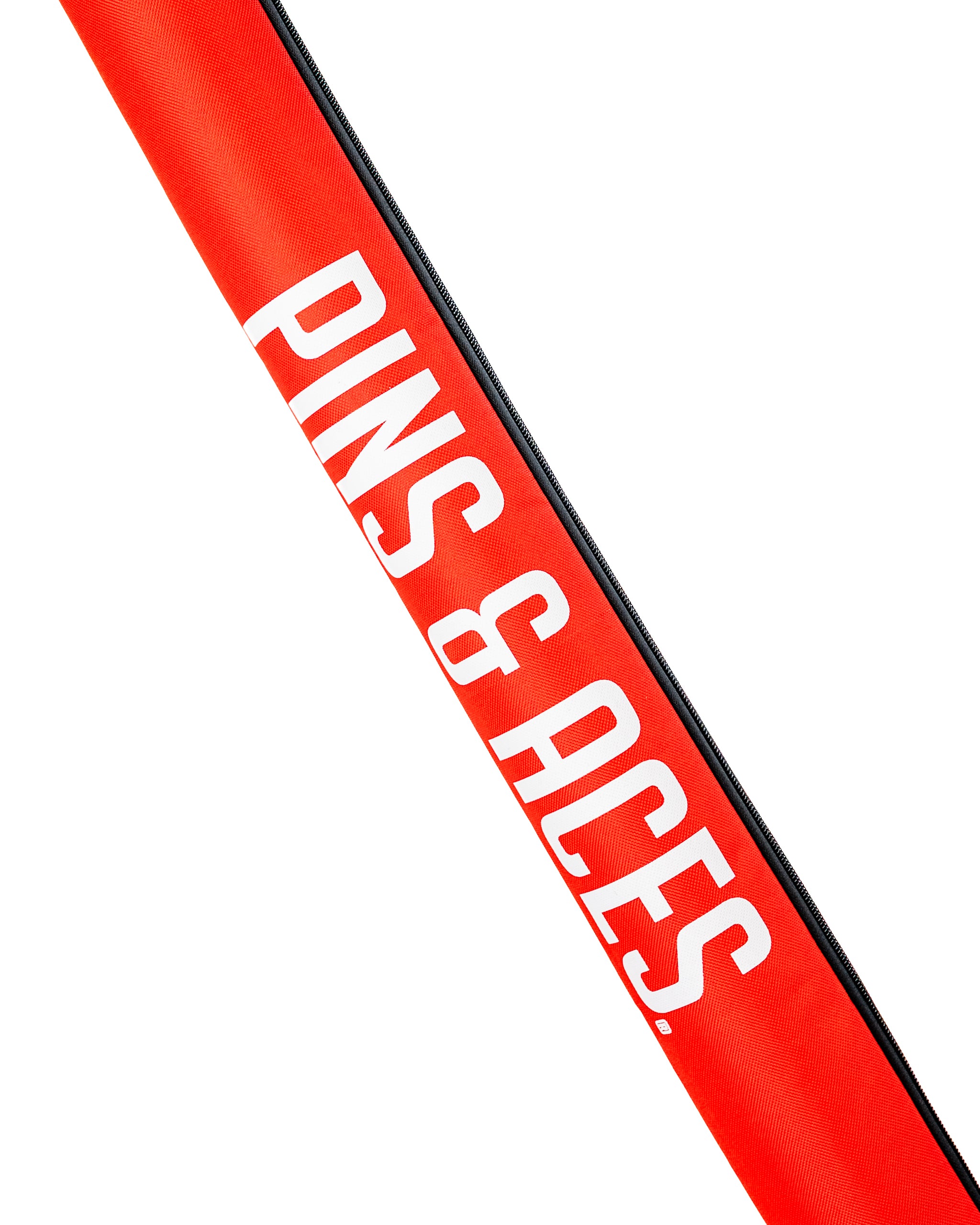 Bold red golf club sleeve featuring "PINS & ACES" branding, designed for golfers who want to make a statement on the course.