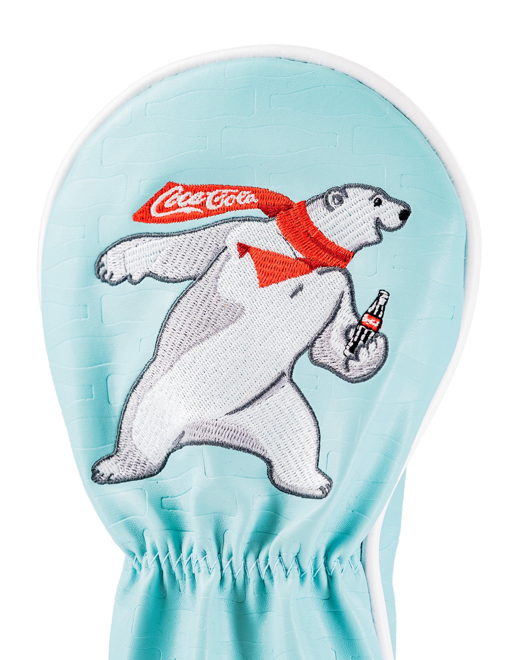 Coca-Cola Fairway Cover featuring a playful polar bear holding a Coke bottle, set against a light blue background.