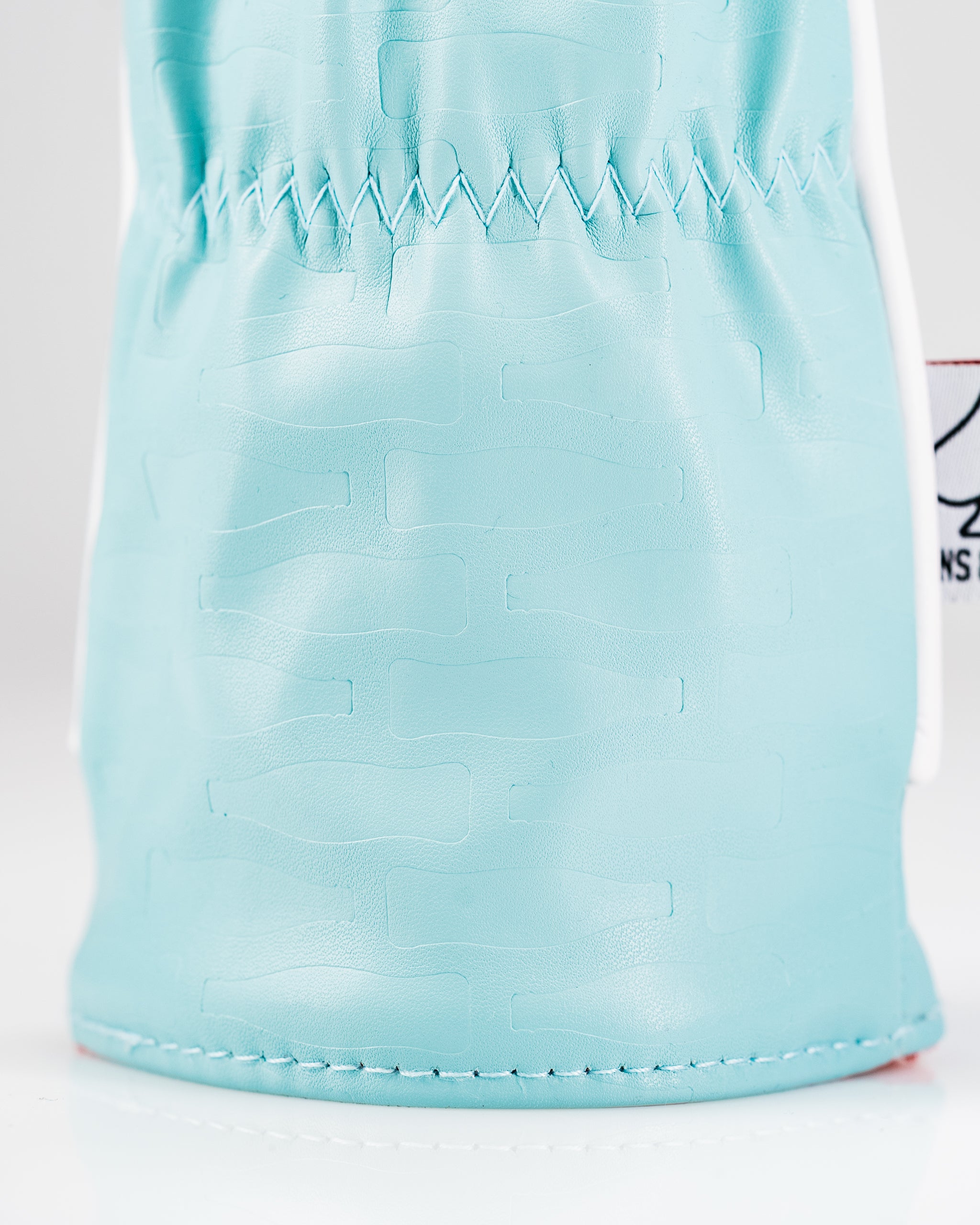 Coca-Cola themed fairway cover featuring a light blue design with textured bottle patterns, perfect for golf enthusiasts.