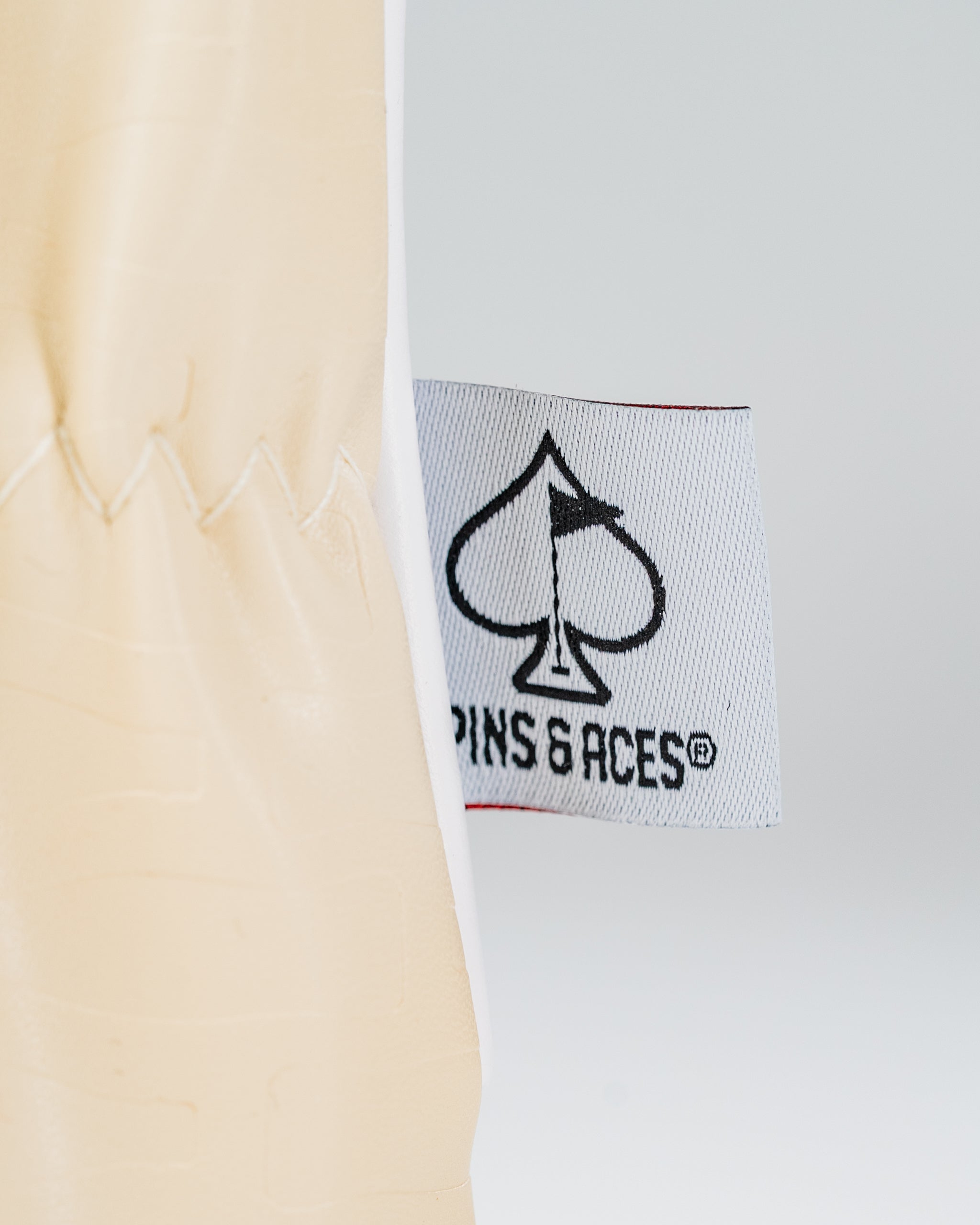 Coca-Cola hybrid golf headcover featuring a sleek design and Pins and Aces branding for a standout look on the course.