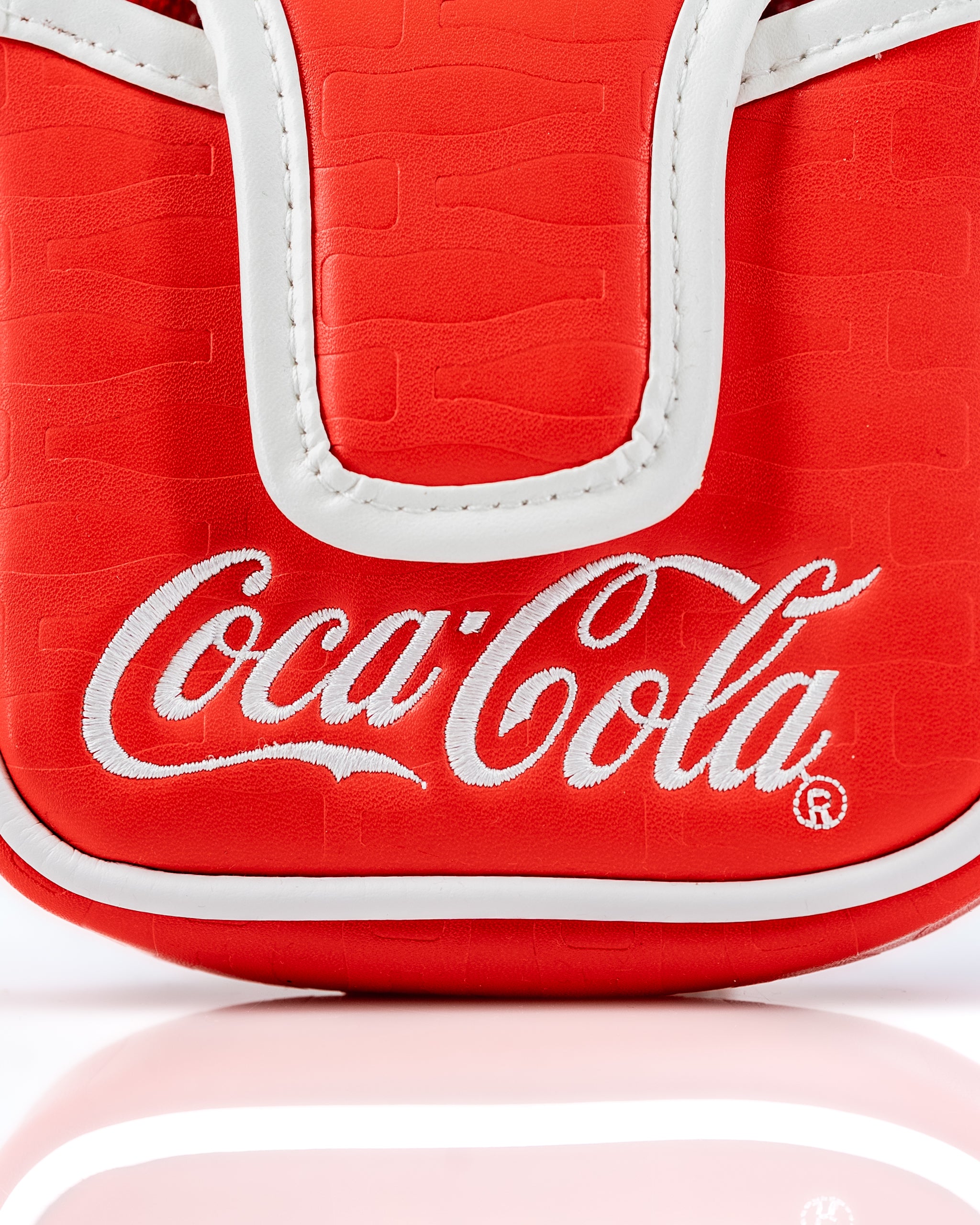 Coca-Cola mallet putter cover in vibrant red with white logo, designed for golfers seeking a bold accessory.
