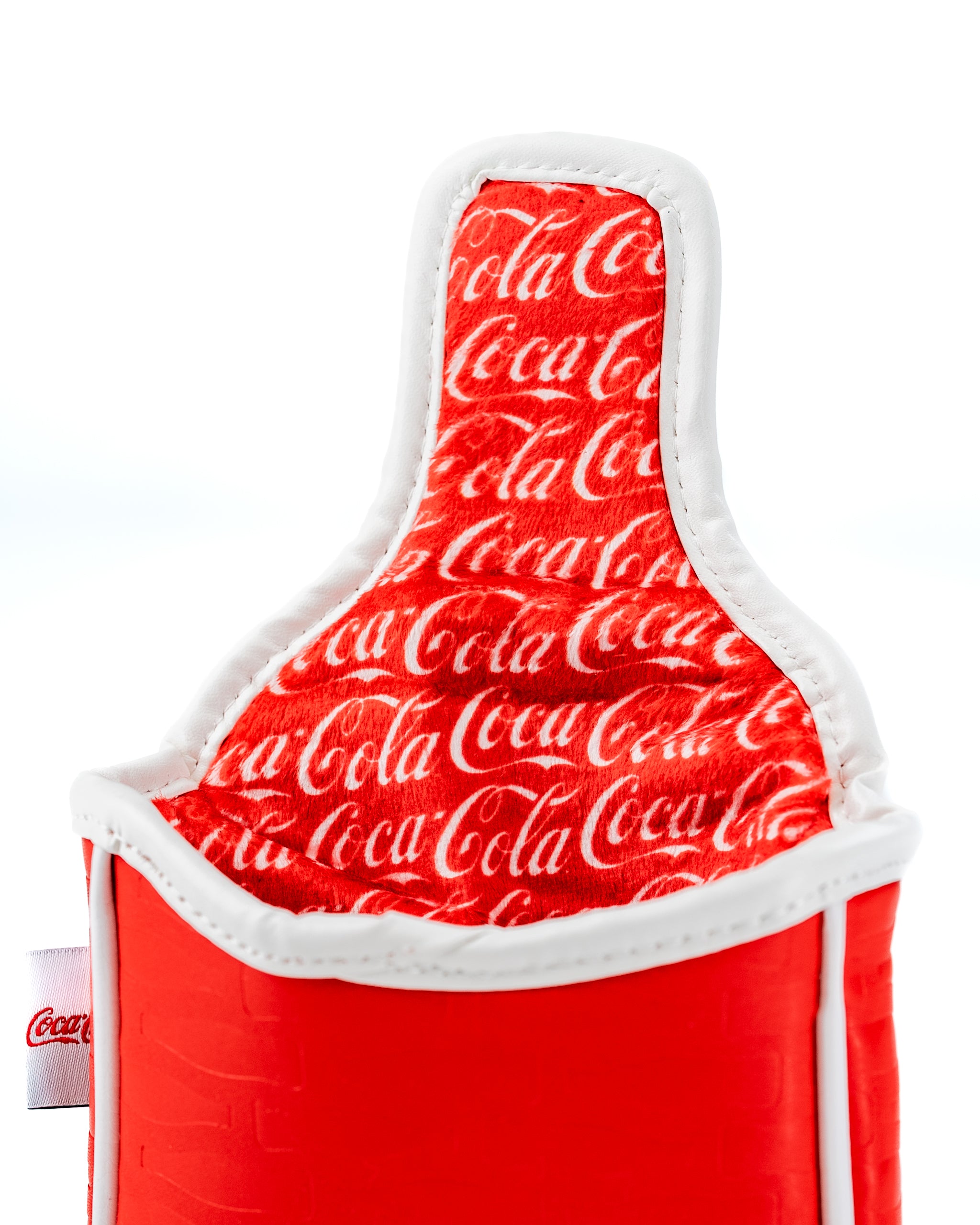 Coca-Cola mallet putter cover featuring a vibrant red design with a repeating logo pattern for stylish golf protection.
