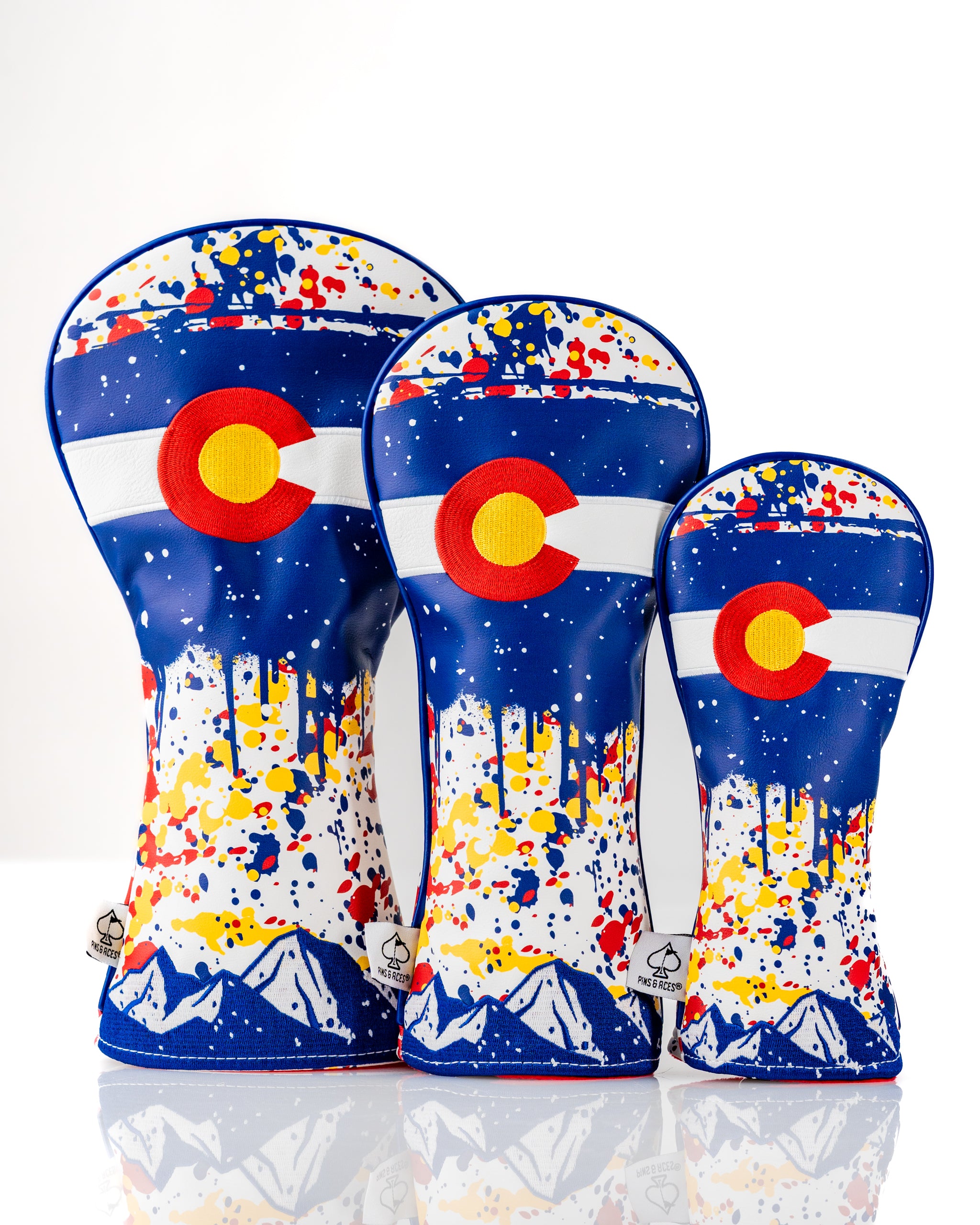 Bold Colorado 2.0 headcover set featuring vibrant colors and a unique splatter design, perfect for standout golf style.