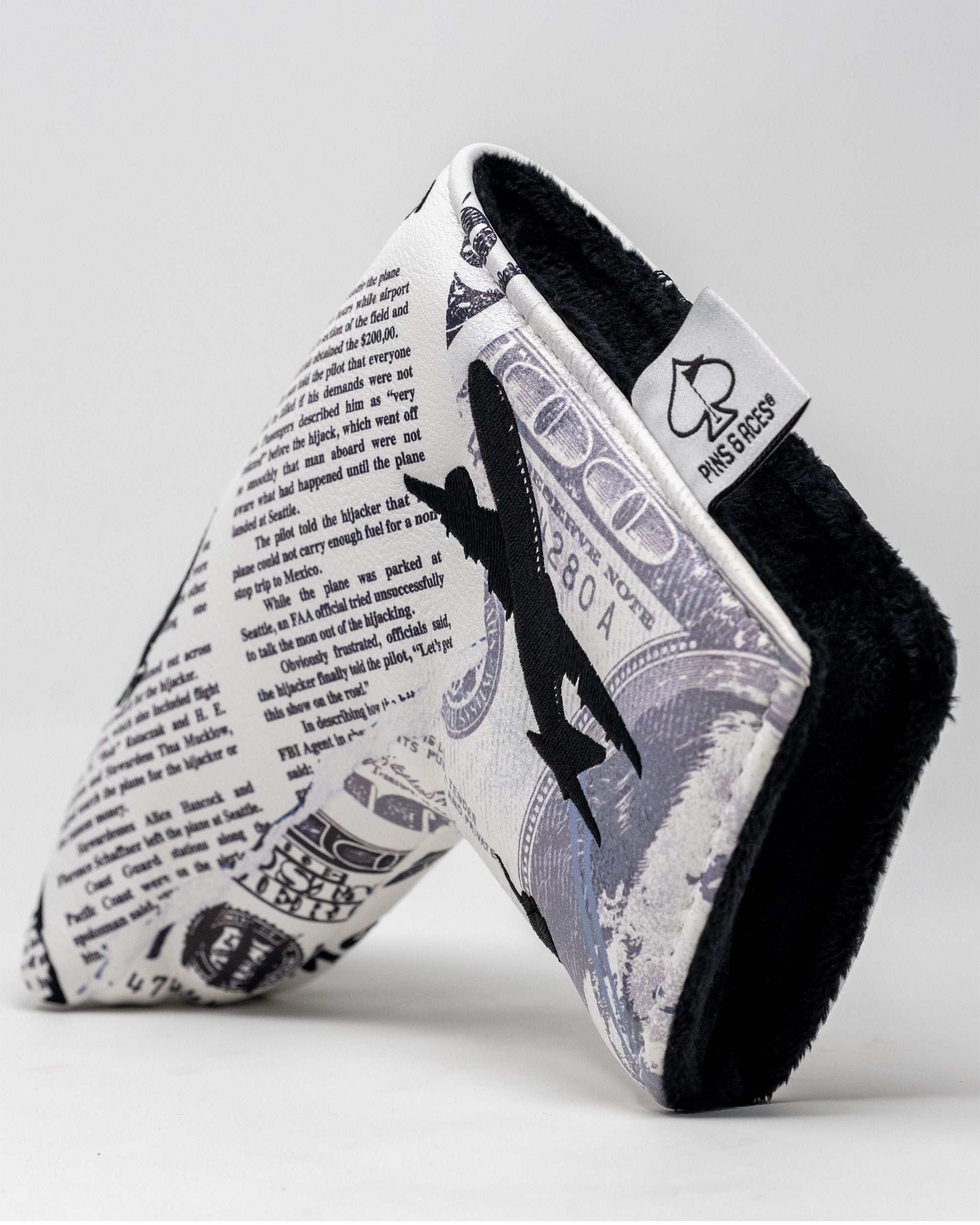 D.B. Cooper Blade Putter Cover featuring a sleek design with a vibrant graphic, ideal for protecting golf putters.