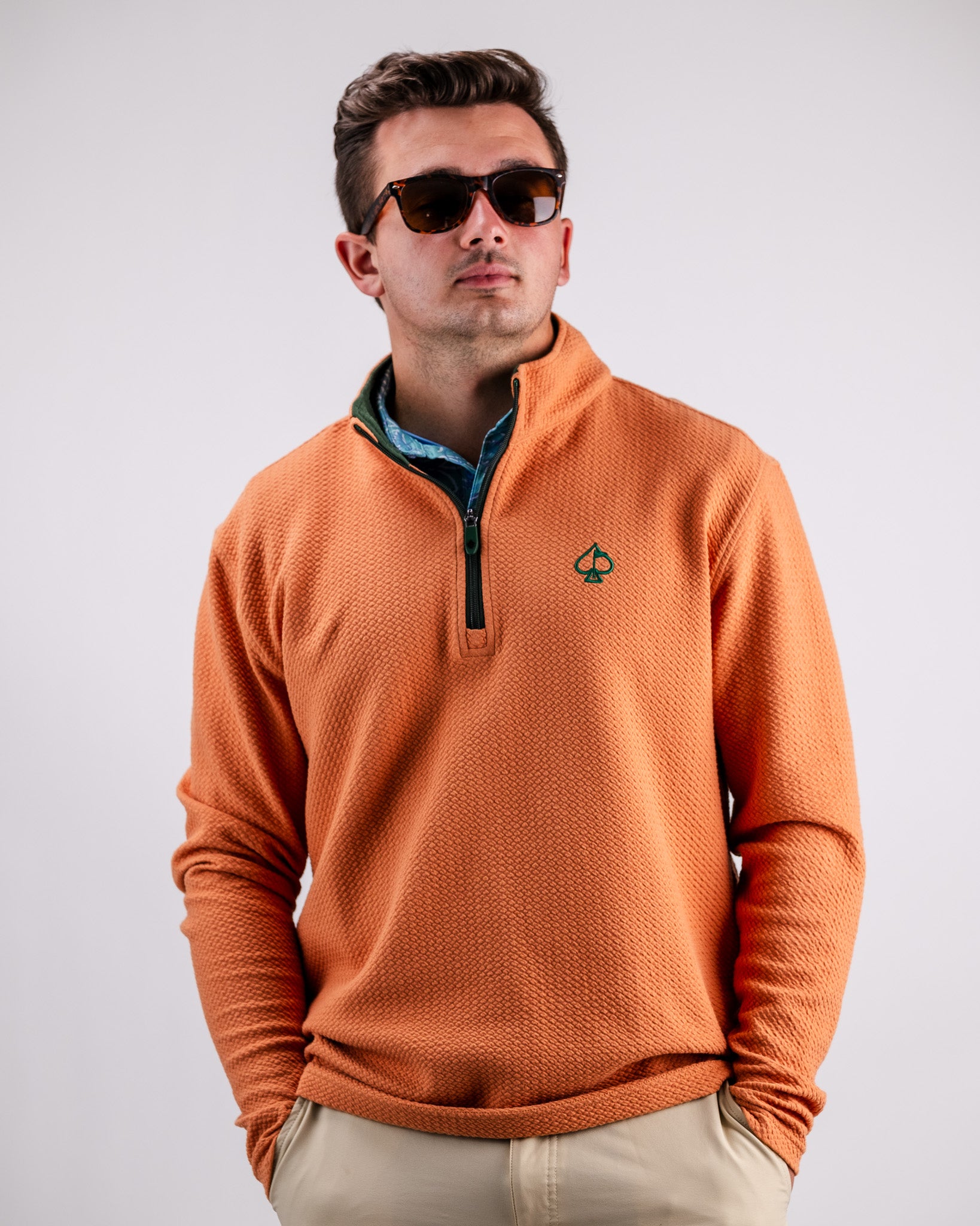 Player Preferred™ Waffle Knit Pullover in Pumpkin color, featuring a textured knit pattern and a relaxed fit.