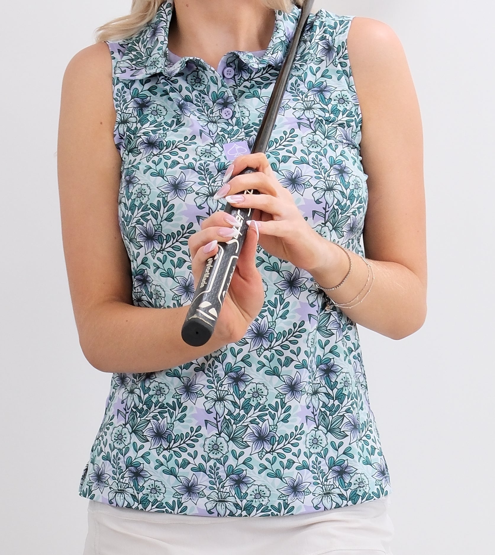 Women's Fresh Floral dress featuring a vibrant flower pattern on a light background, showcasing a sleeveless design and a flattering fit.