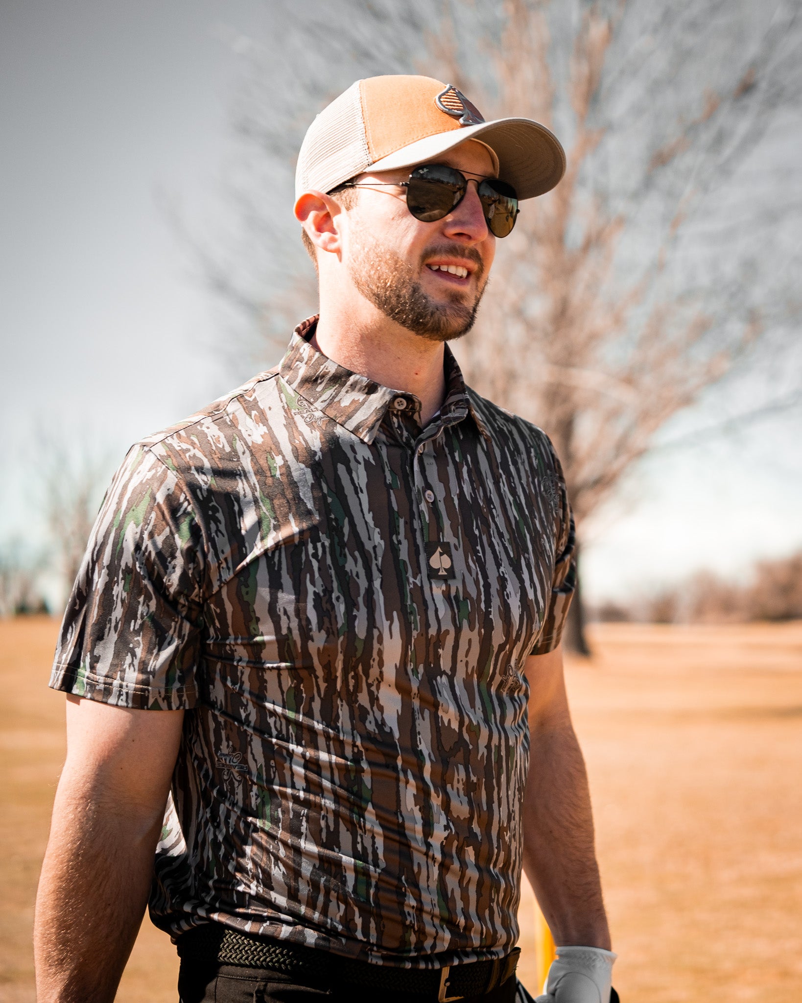 Men's Realtree Original Polo shirt featuring a camouflage pattern and classic fit.