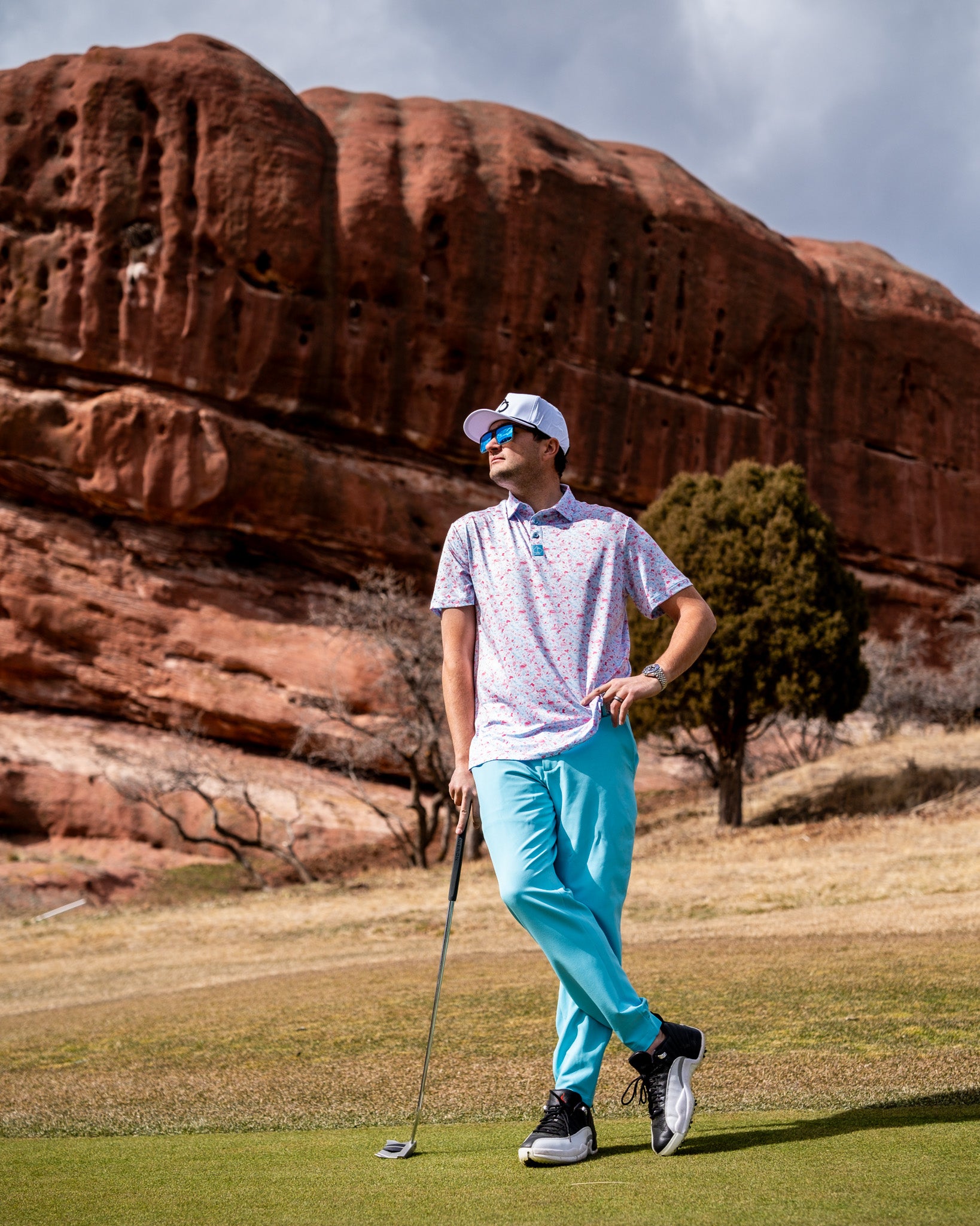 Sky blue performance joggers displayed on a flat surface, showcasing their lightweight fabric and elastic waistband.