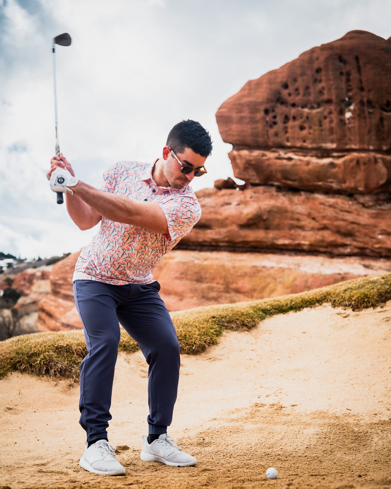 Navy Performance Jogger featuring a tapered fit and adjustable waistband, ideal for athletic activities.