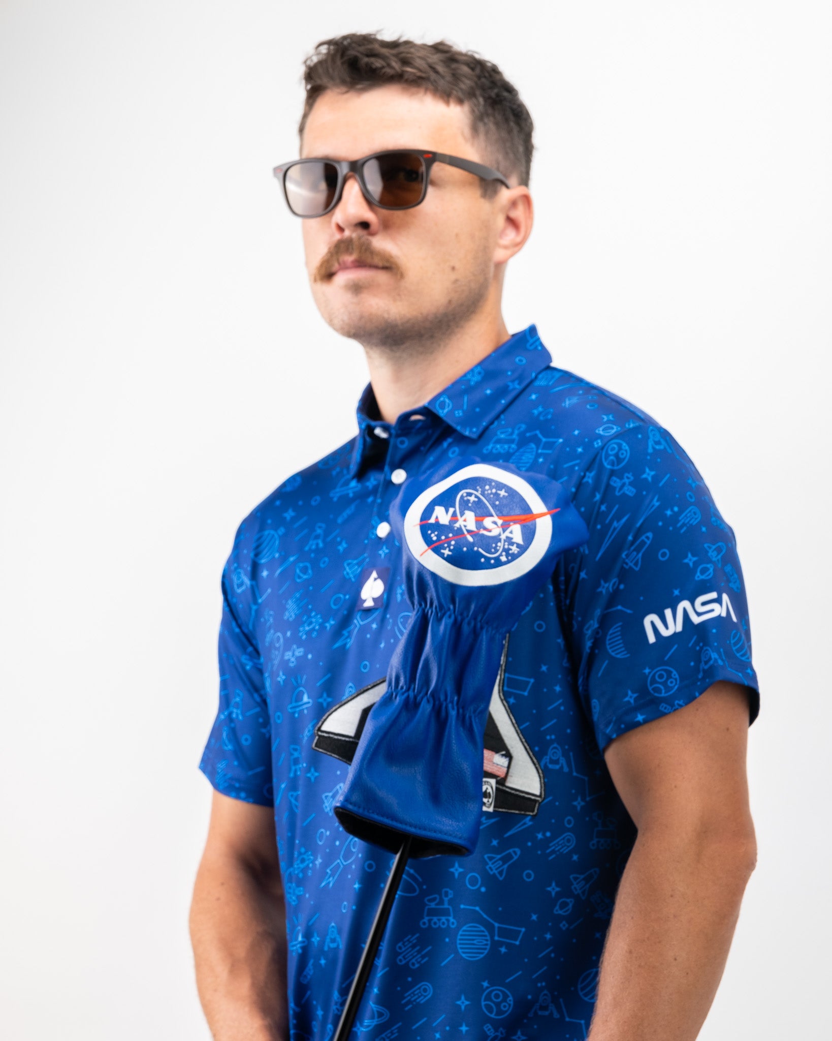 NASA Polo shirt featuring an embroidered logo on the left chest, available in navy blue with a classic collar and short sleeves.