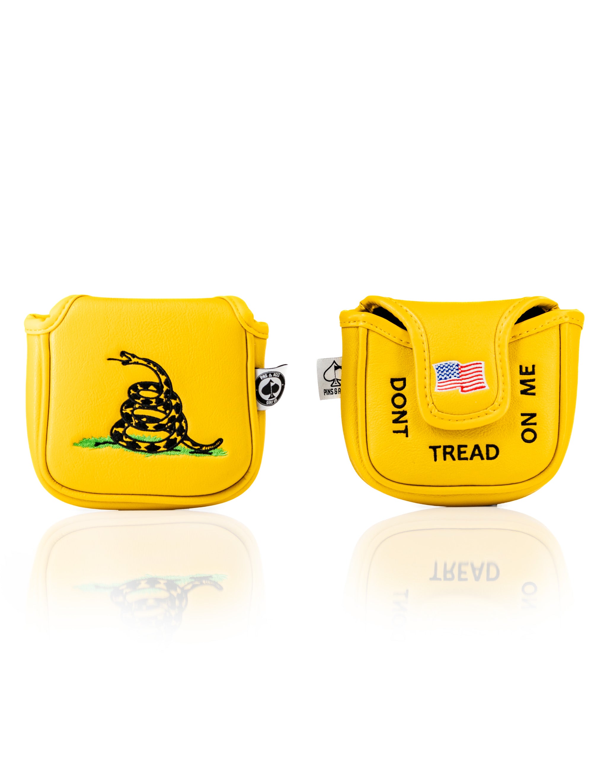 Bold yellow mallet putter cover featuring a coiled snake design and "Don't Tread on Me" text, perfect for standout golfers.