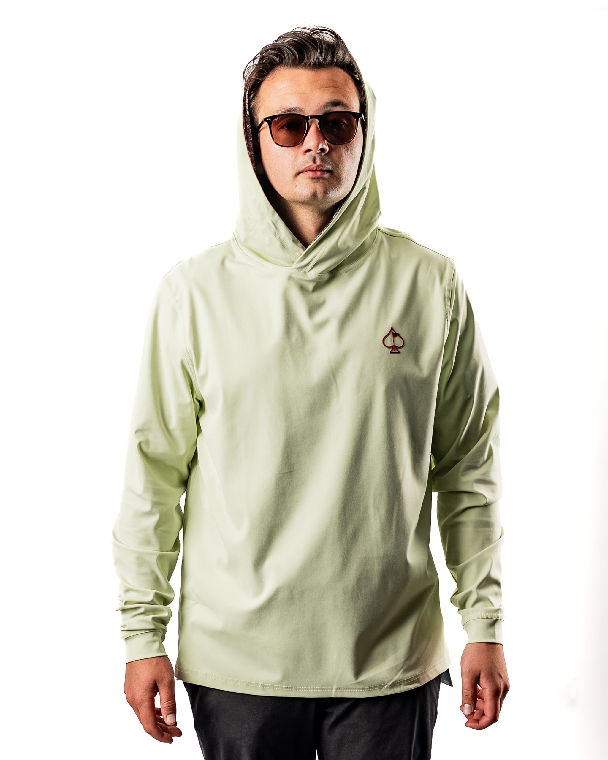Men's performance golf hoodie in Desert Sage, featuring a relaxed fit and stylish hood for comfort on the course.