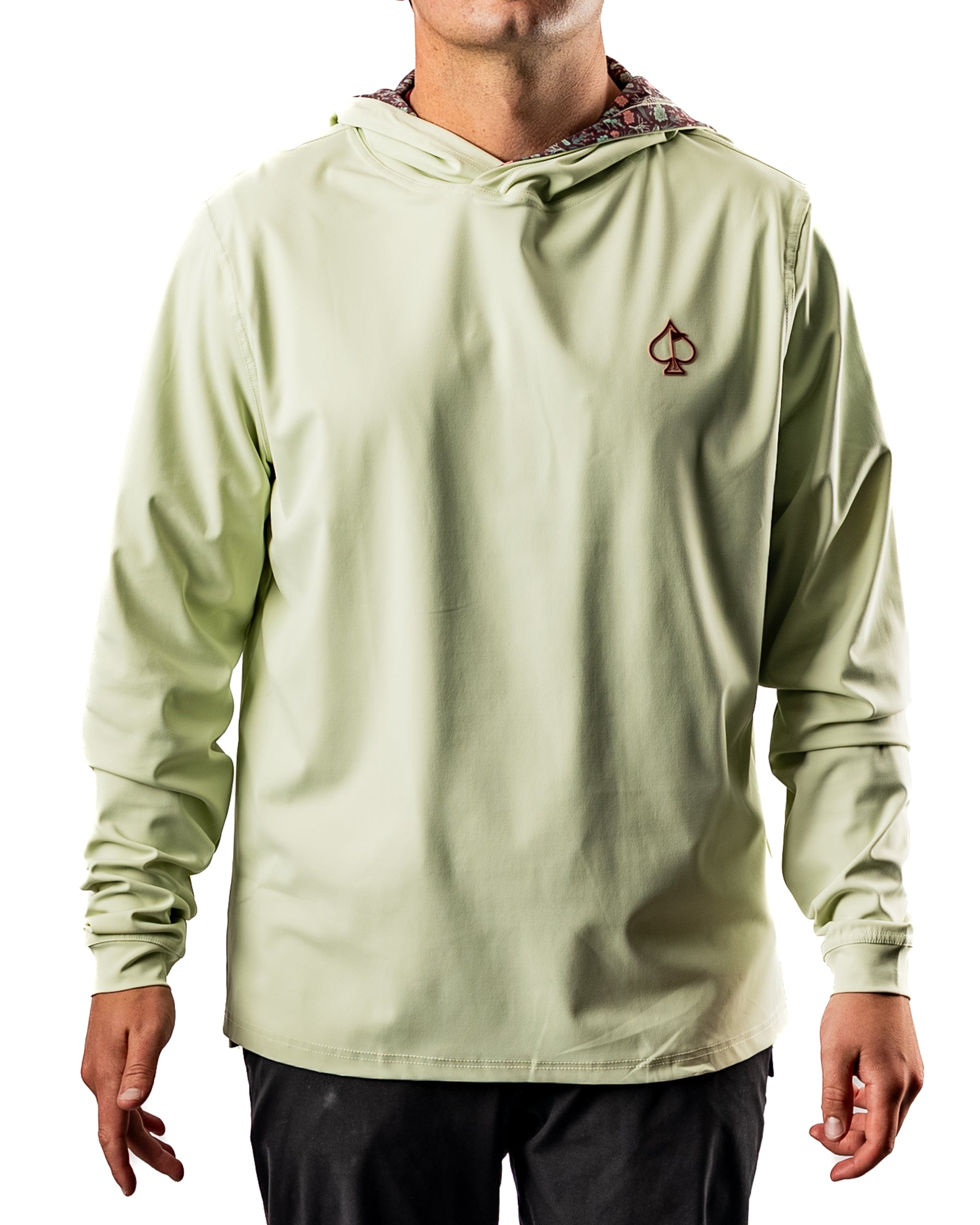 Men's performance golf hoodie in desert sage color, featuring a stylish hood and logo, perfect for on-course comfort.