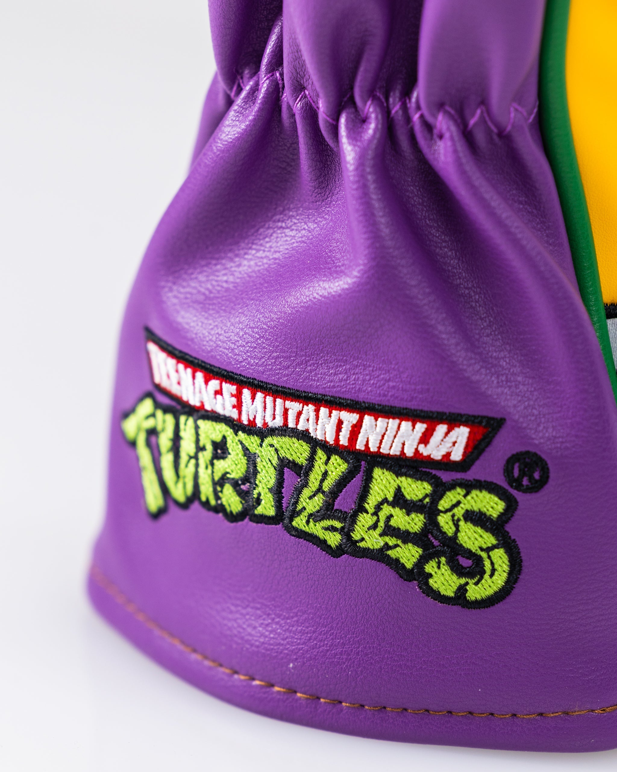 TMNT Donatello hybrid golf club cover featuring Donatello's character design with vibrant colors and distinct detailing.