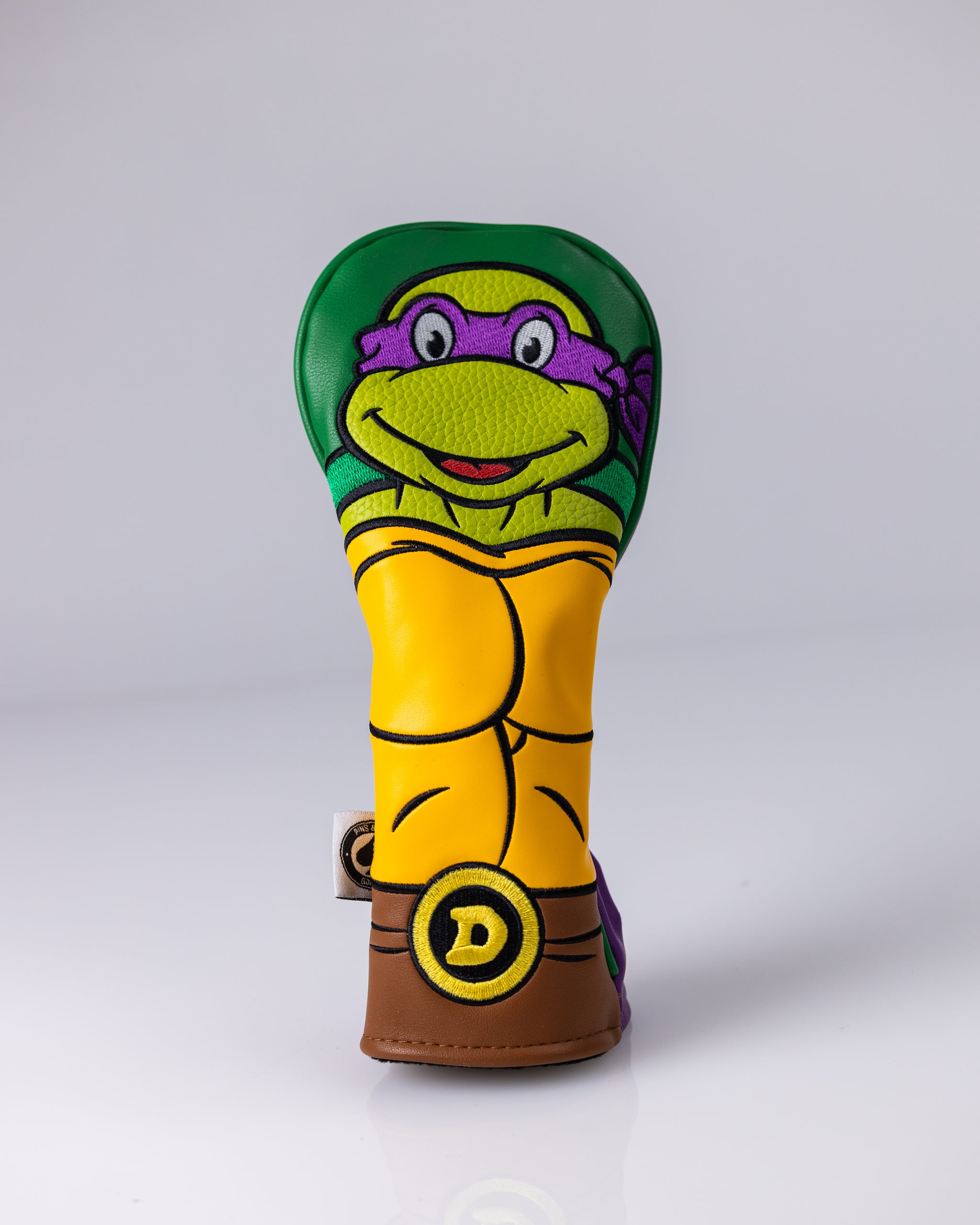 TMNT Donatello Hybrid Cover featuring a vibrant design of Donatello from Teenage Mutant Ninja Turtles, showcasing his signature purple mask and bo staff against a dynamic background.