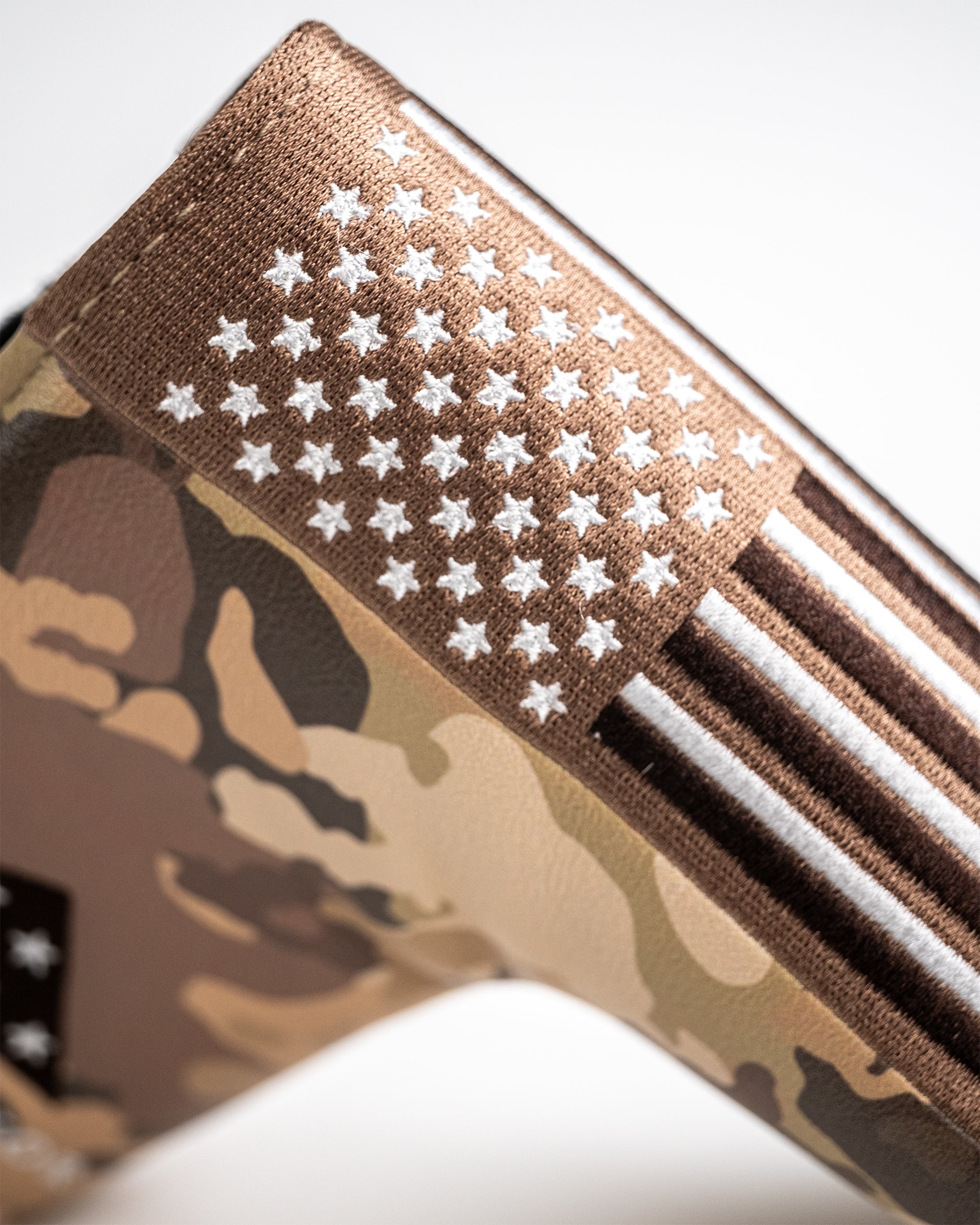 Folds of Honor 2.0 Blade Putter Cover featuring a sleek design with patriotic colors and logo, designed for optimal protection of golf putters.