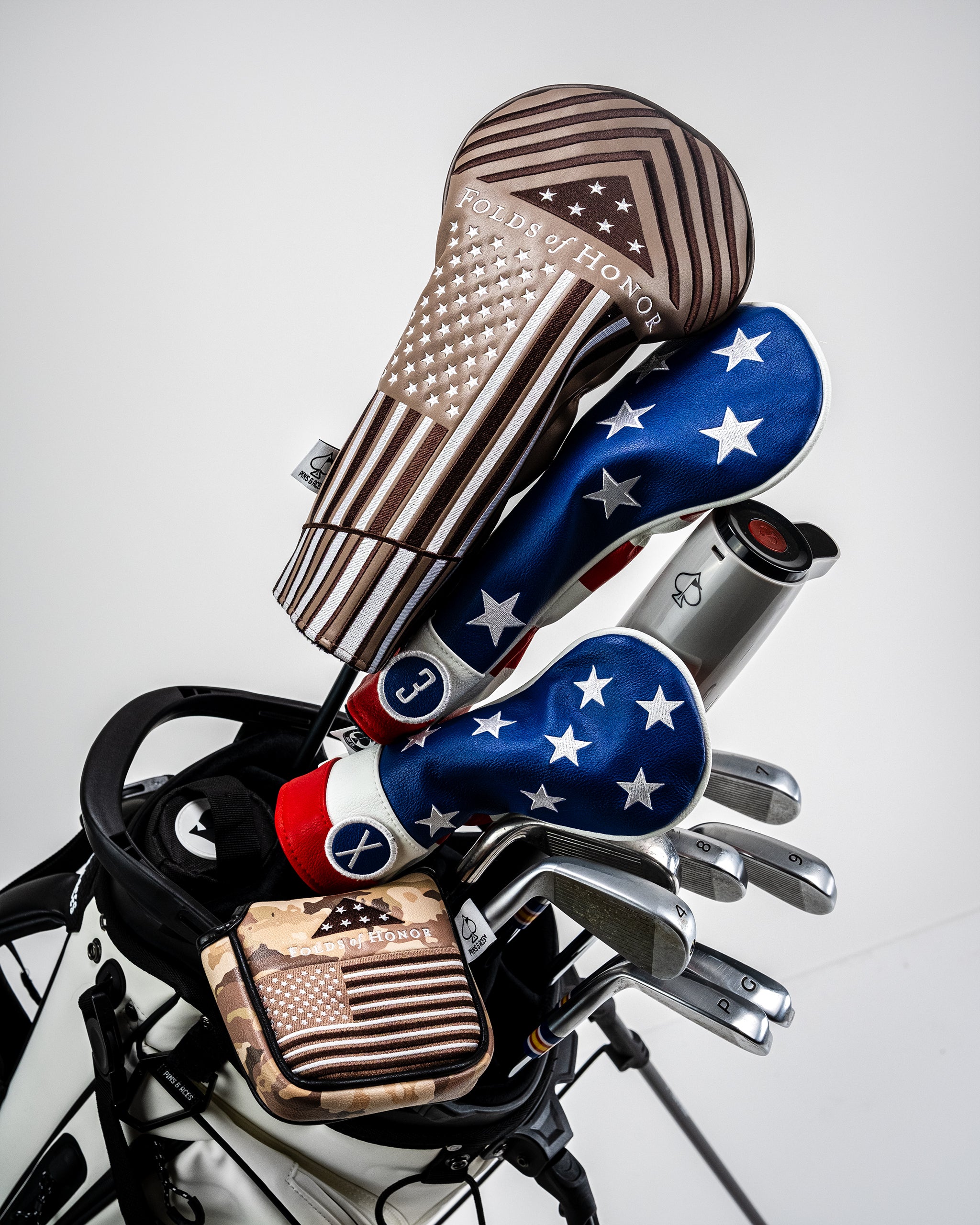 Folds of Honor 2.0 mallet putter cover in black with embroidered logo and protective padding.