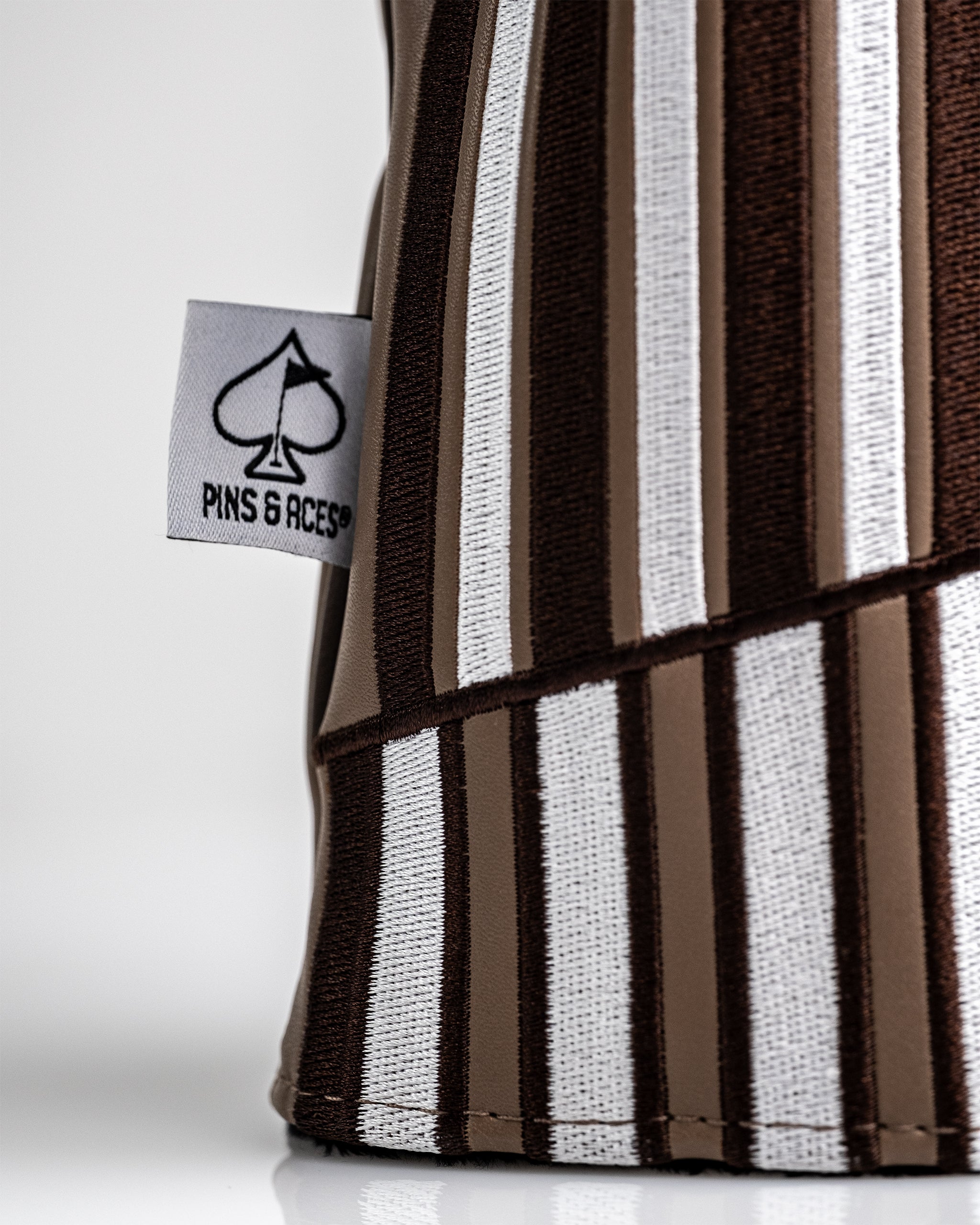 Folds of Honor 2.0 driver cover in dark navy with embroidered logo, designed for golf clubs.