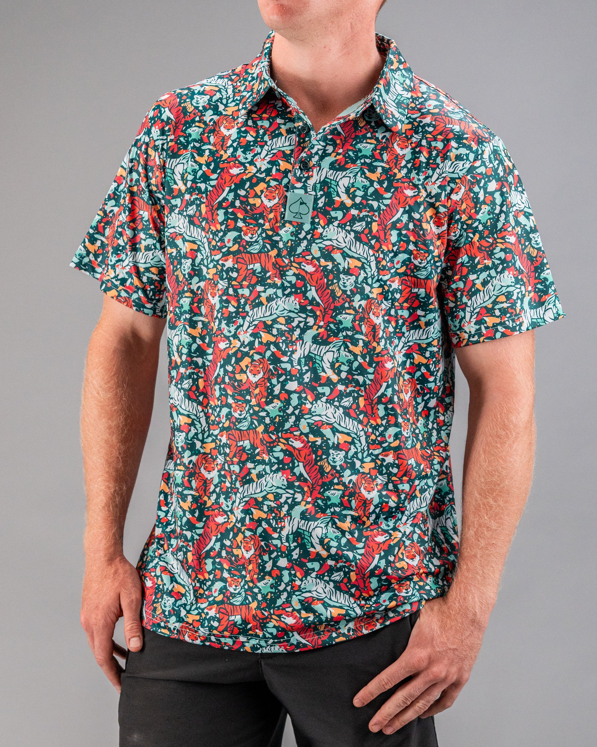 Bold teal golf shirt featuring a vibrant tiger and floral pattern, perfect for golfers who want to stand out on the course.