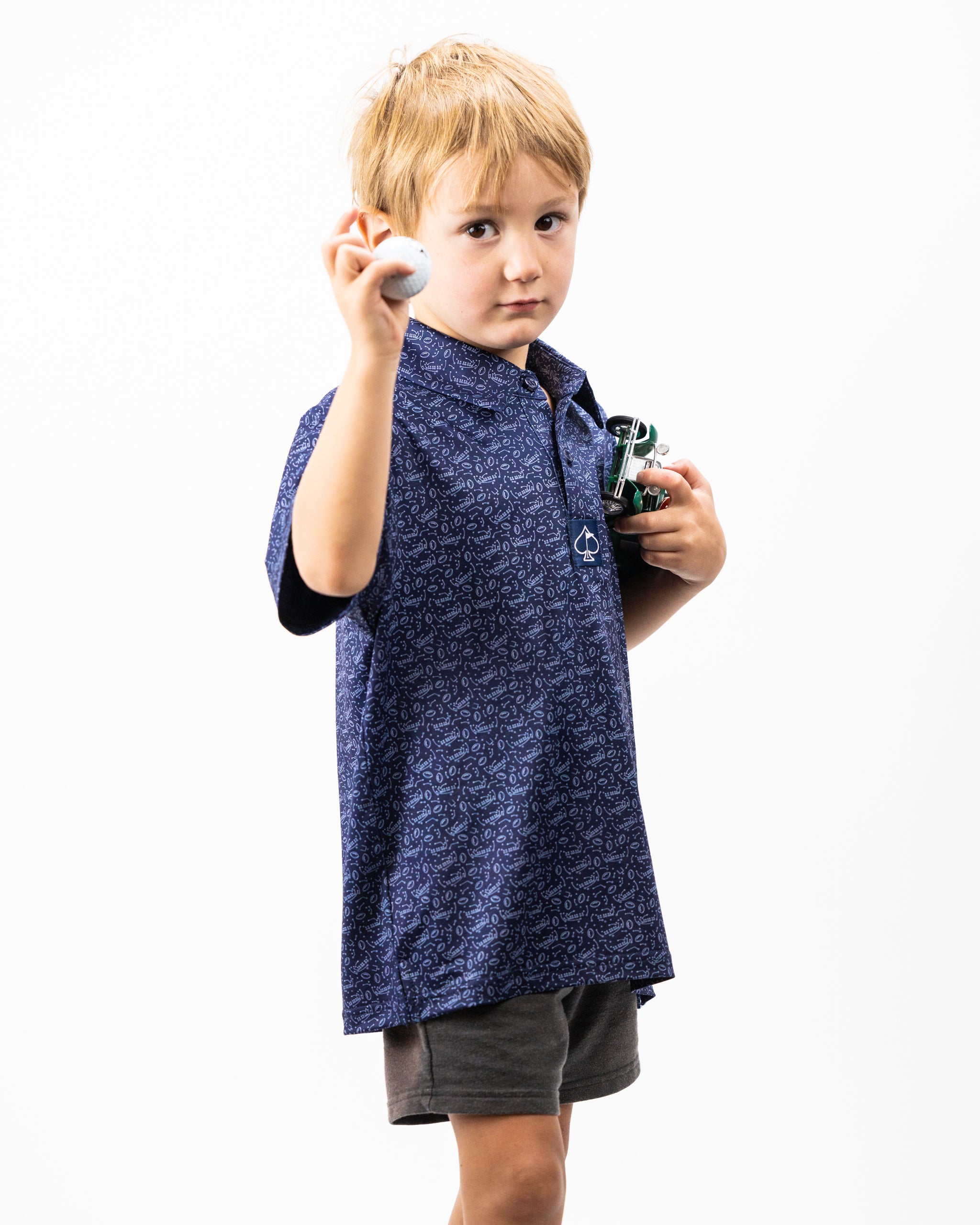 Youth Playmaker polo shirt in vibrant colors, designed for active kids, featuring a comfortable fit and breathable fabric.