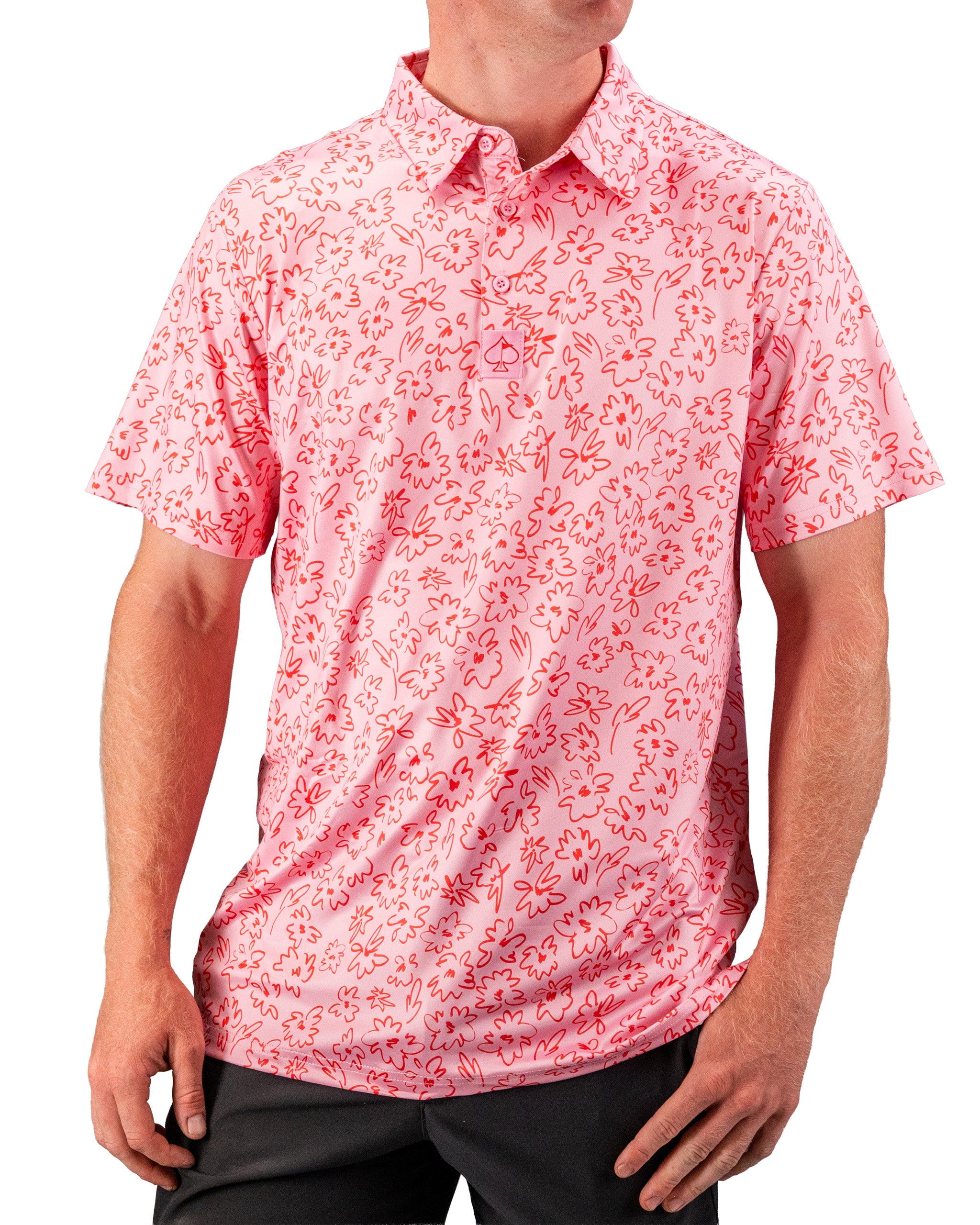 Men's short-sleeve golf shirt in pink with a playful flower doodle pattern, perfect for a stylish day on the course.