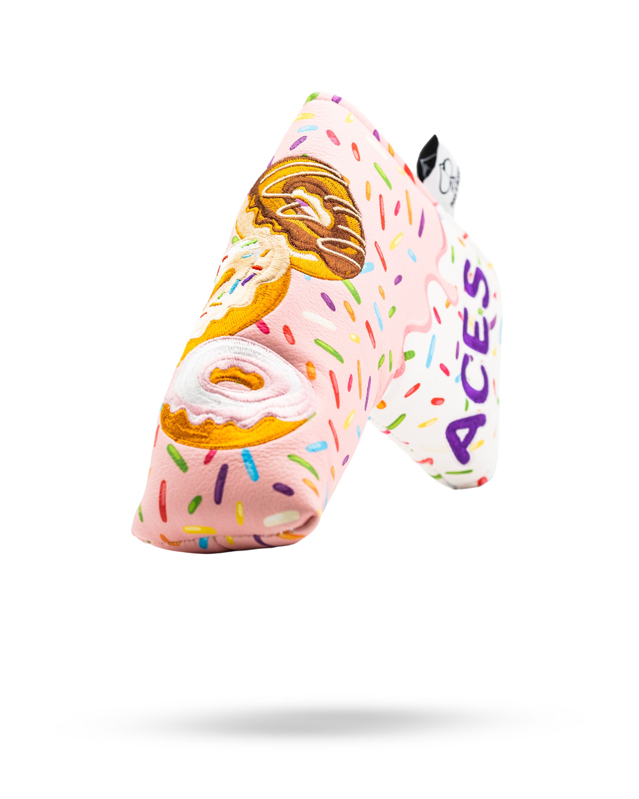 Colorful blade putter cover featuring a donut design with sprinkles, adding a fun touch to your golf gear.